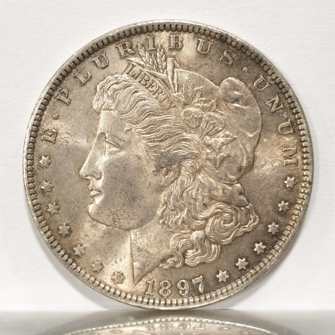 博洋堂世界钱币拍卖第115期（全场包邮） 1897美国摩根银币，淡黄油光，裸币状态极佳，ms63状态