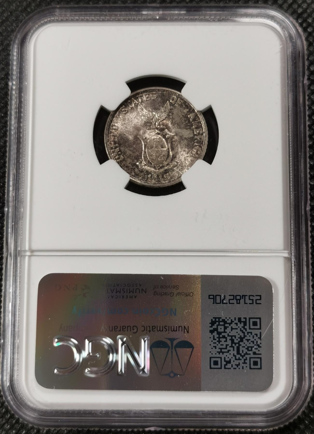 甄臻铺-世界钱币拍卖（第9期）新铺开张，欢迎捧场 NGC-MS65 1945年美属菲律宾20分银币，带包浆的高分少见