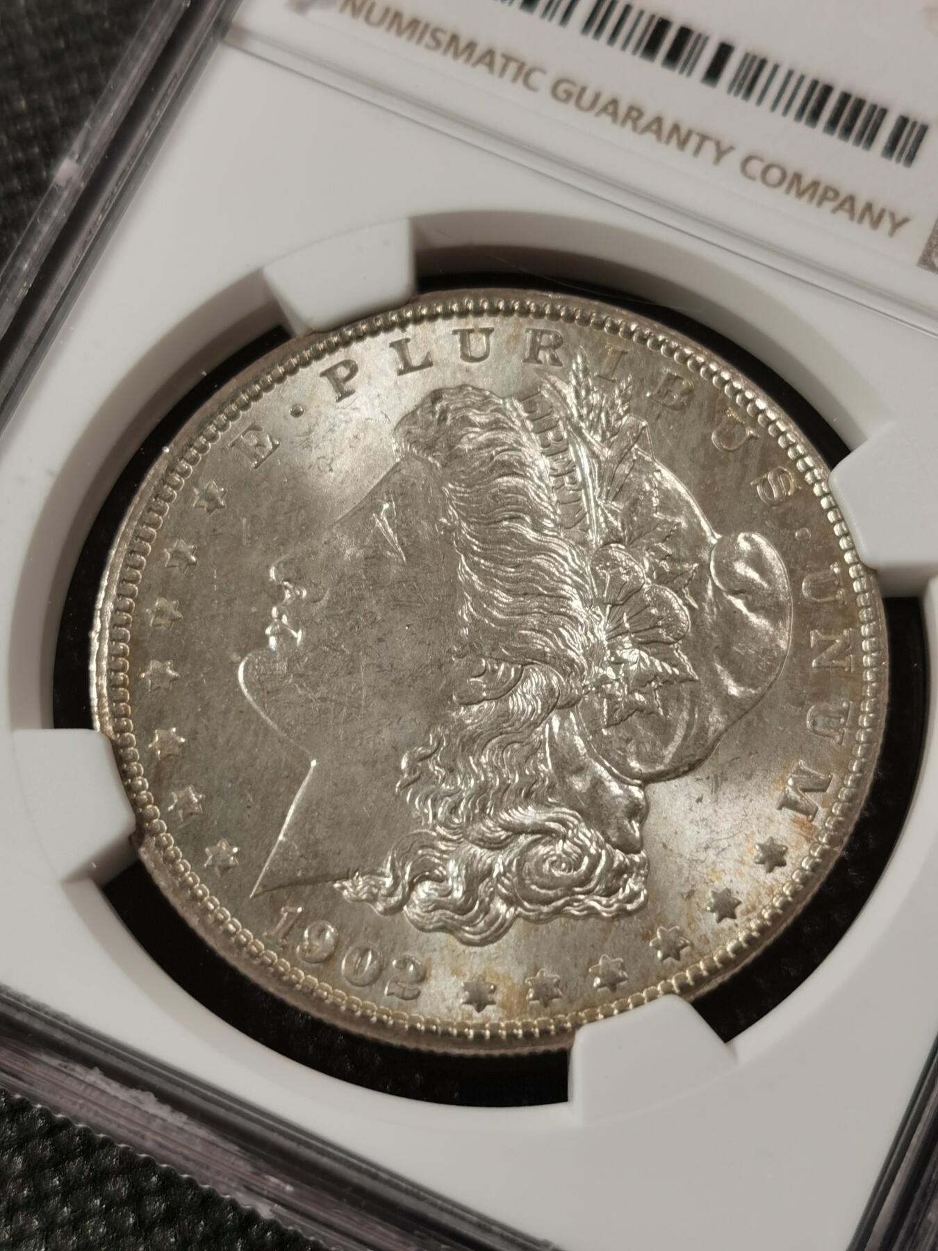 甄臻铺-世界钱币拍卖（第9期）新铺开张，欢迎捧场 NGC-MS63 1902年O版美国摩根银币，强转光，少年份