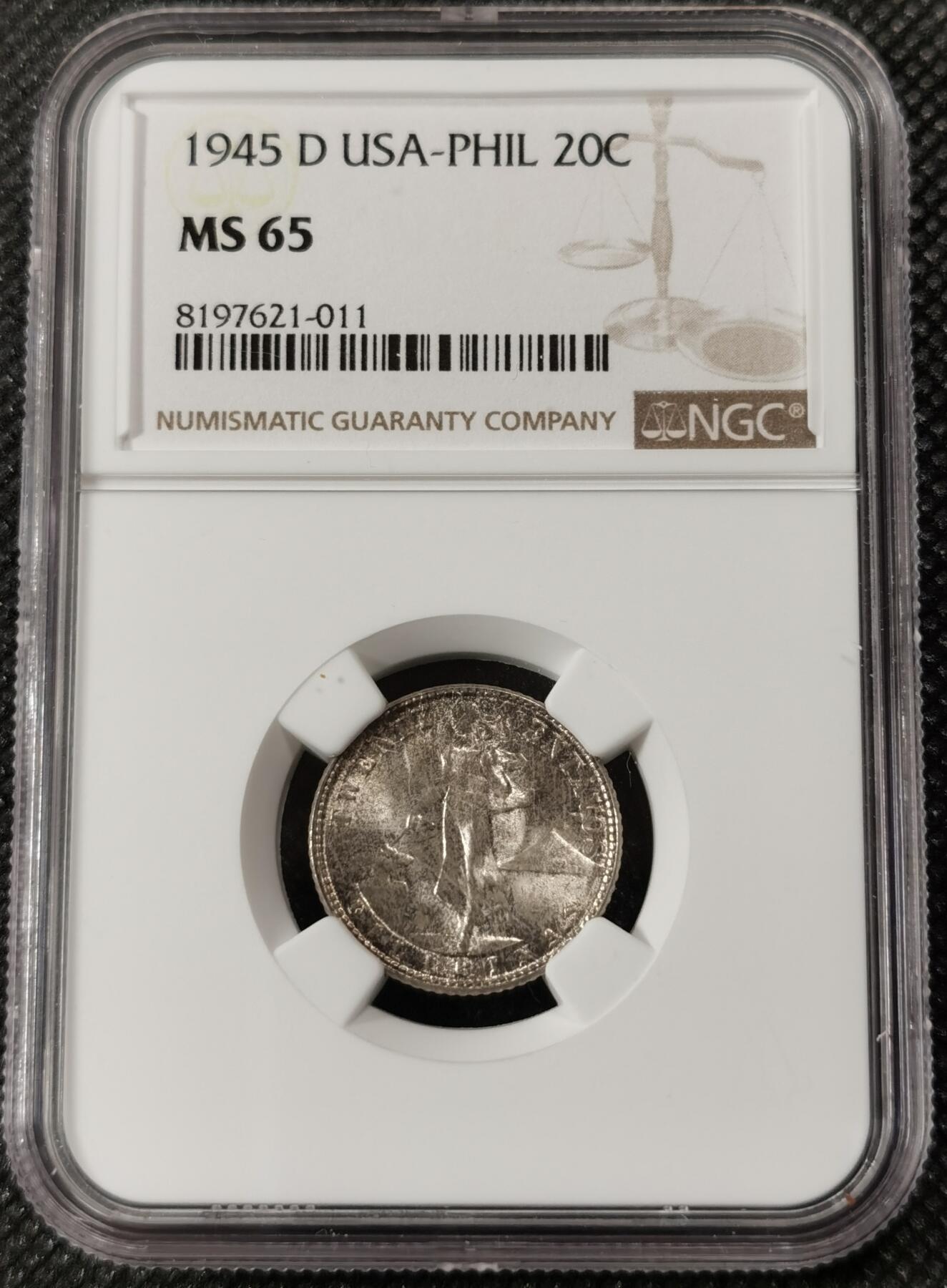 甄臻铺-世界钱币拍卖（第9期）新铺开张，欢迎捧场 NGC-MS65 1945年美属菲律宾20分银币，带包浆的高分少见