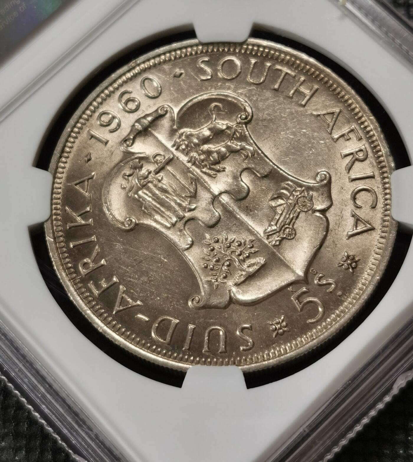 甄臻铺-世界钱币拍卖-南非西非东非专场（第10期）送拍享返佣金等优惠多多 NGC-MS62 南非联盟成立50周年 1960 5先令 银币 原味包浆，币面转光