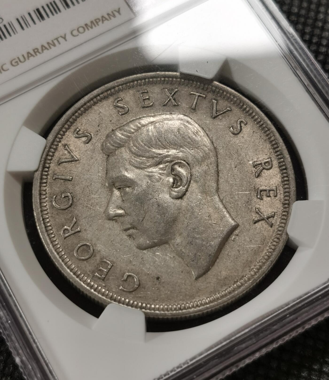 甄臻铺-世界钱币拍卖-南非西非东非专场（第10期）送拍享返佣金等优惠多多 NGC-AU58 英属南非 1949 5先令 银币 原味包浆，币面漂亮