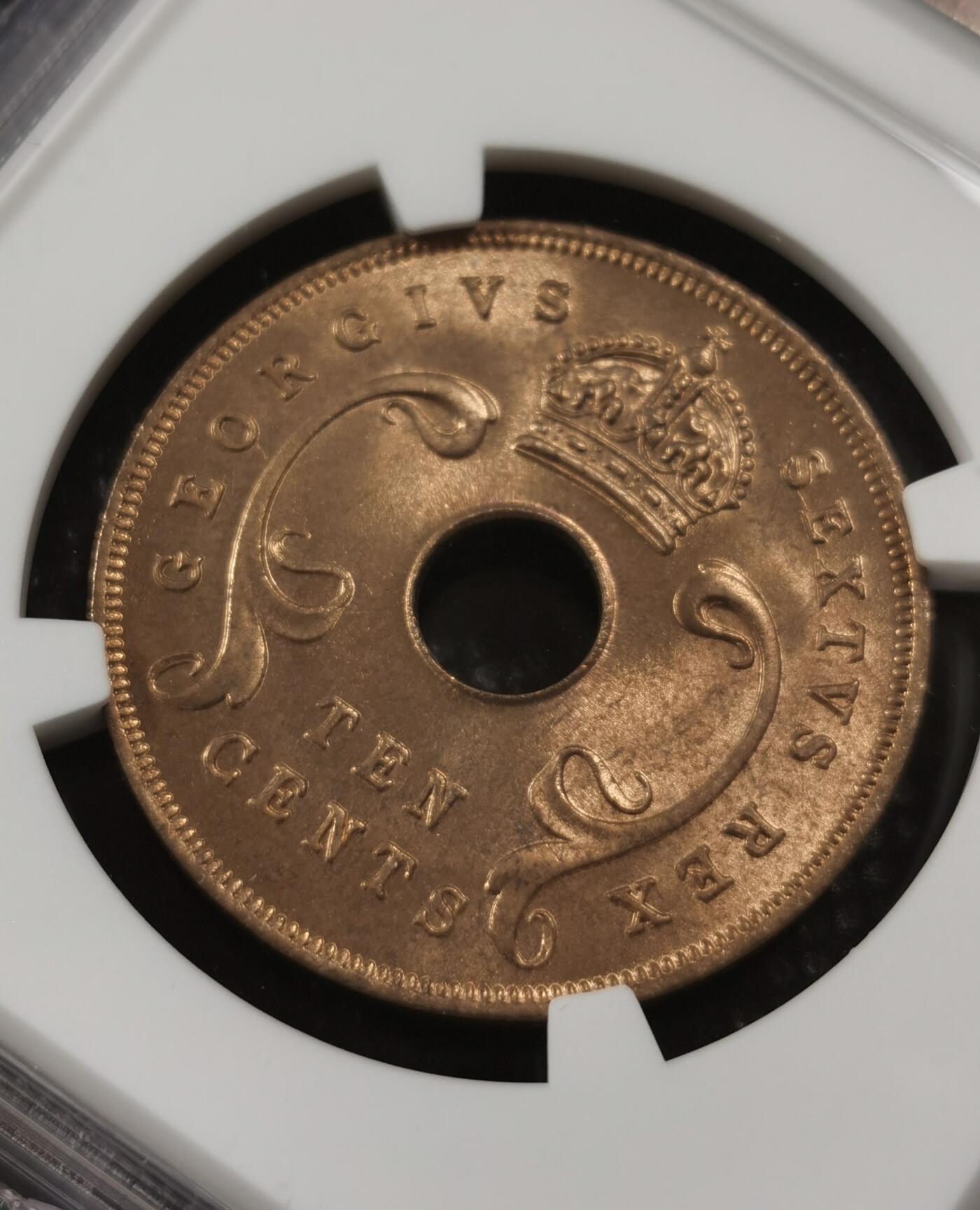 甄臻铺-世界钱币拍卖-南非西非东非专场（第10期）送拍享返佣金等优惠多多 NGC-MS65 英属东非 1952 10分 原味包浆，币面漂亮