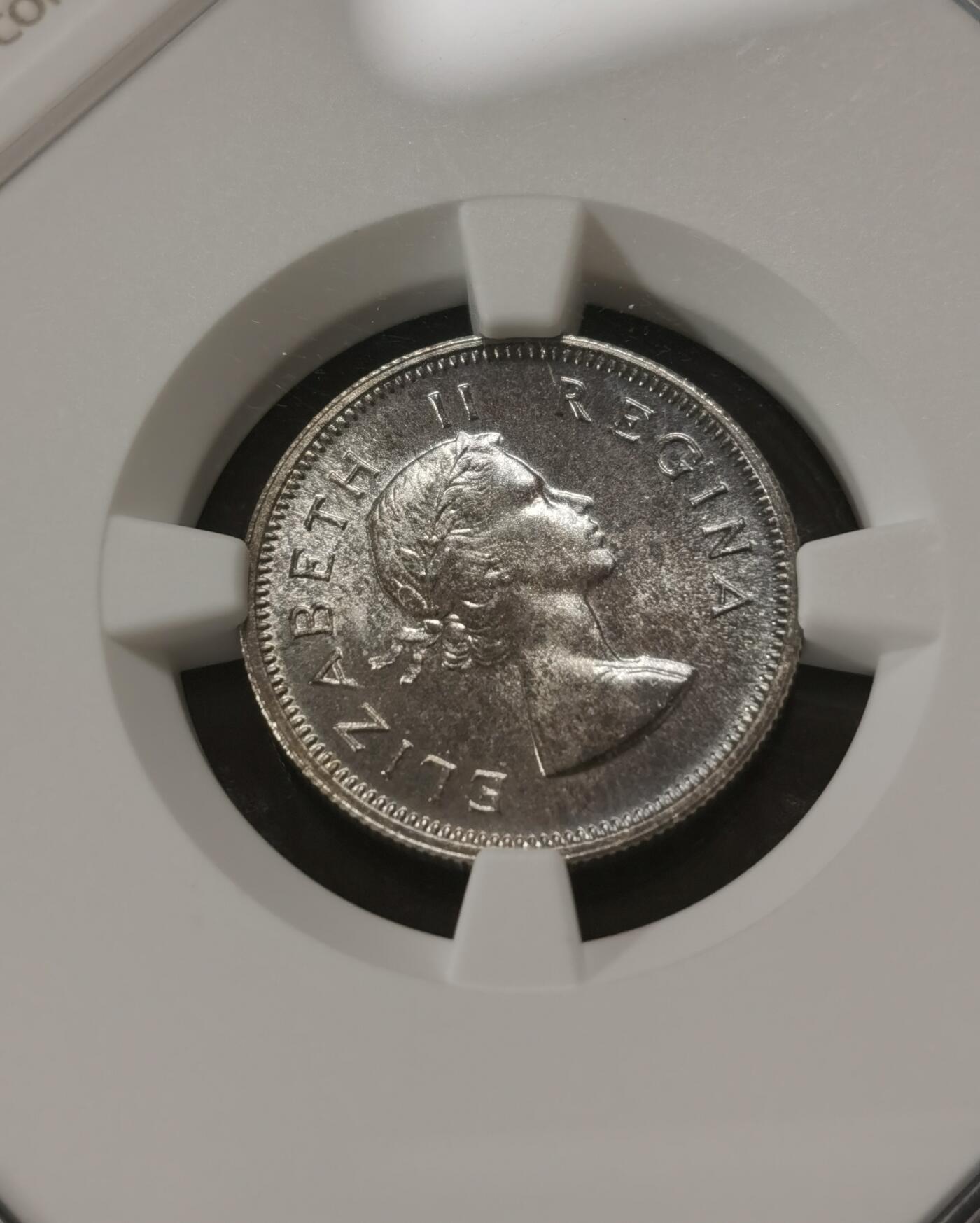 甄臻铺-世界钱币拍卖-南非西非东非专场（第10期）送拍享返佣金等优惠多多 NGC-PF66 英属南非 1953 6便士 精制 原味包浆，币面转光