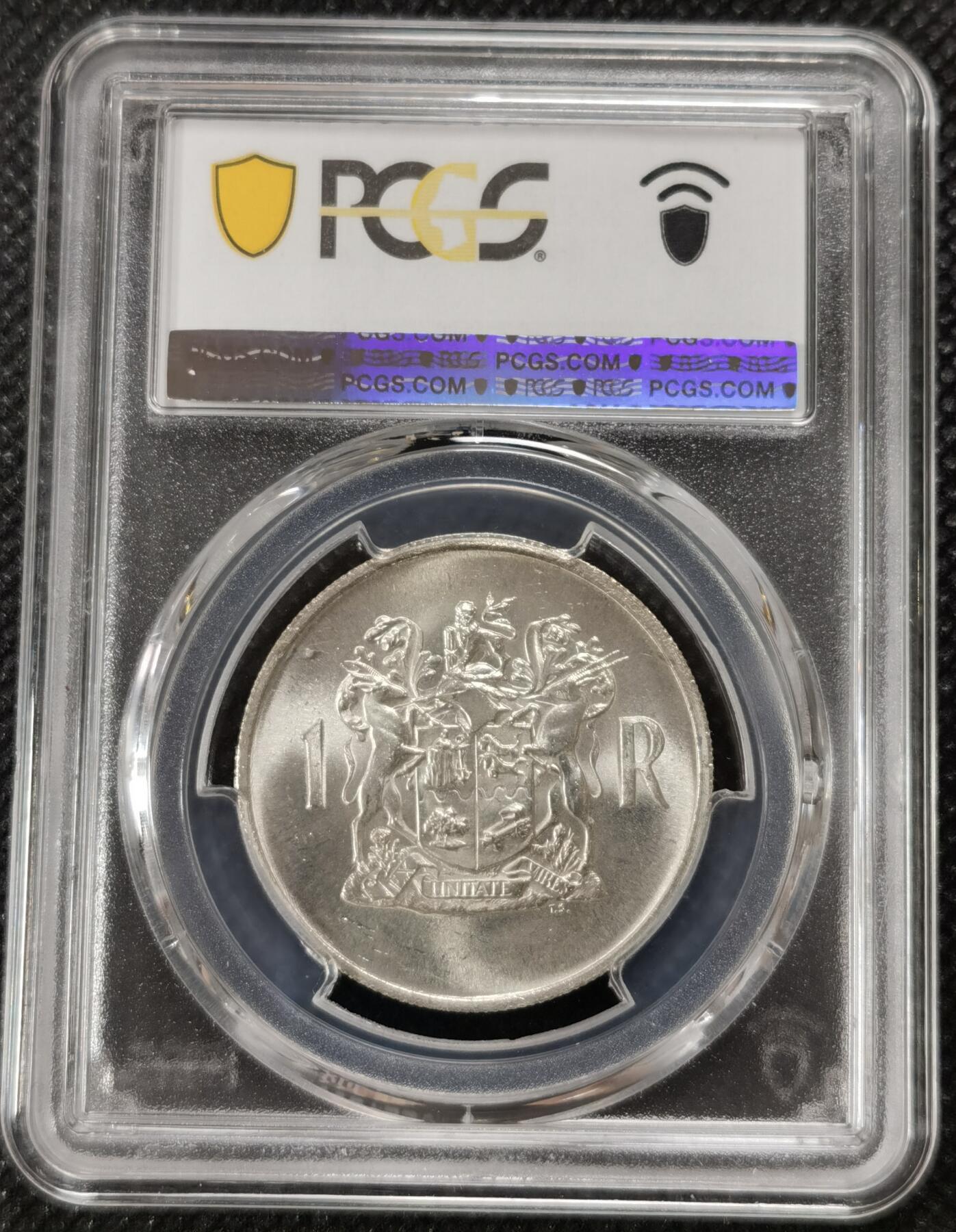 甄臻铺-世界钱币拍卖-南非西非东非专场（第10期）送拍享返佣金等优惠多多 PCGS-MS66 南非 1969 1兰特T.E.顿格斯纪念银币