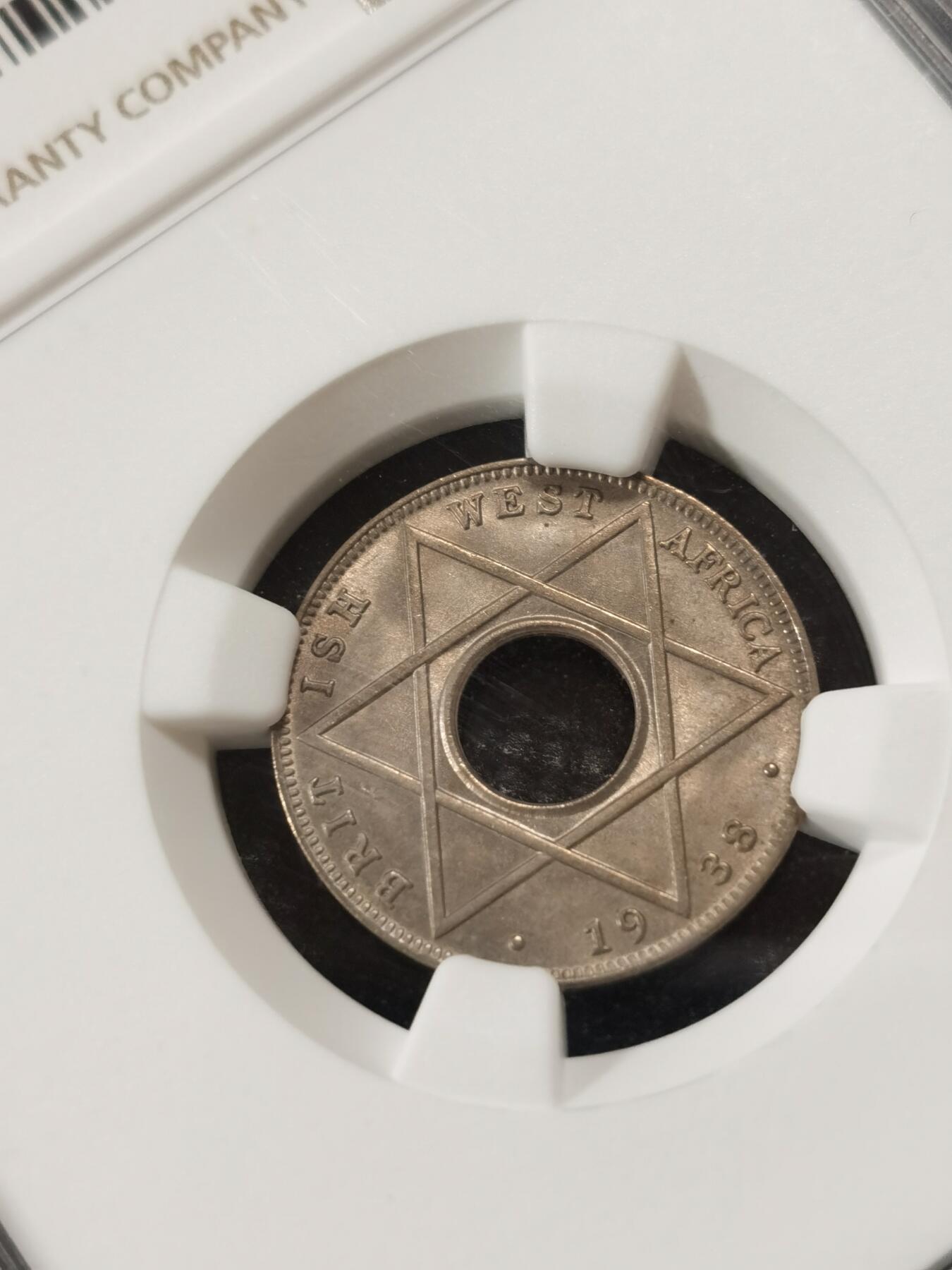 甄臻铺-世界钱币拍卖-南非西非东非专场（第10期）送拍享返佣金等优惠多多 NGC-MS64 英属西非 1938 1/10便士 状态不错