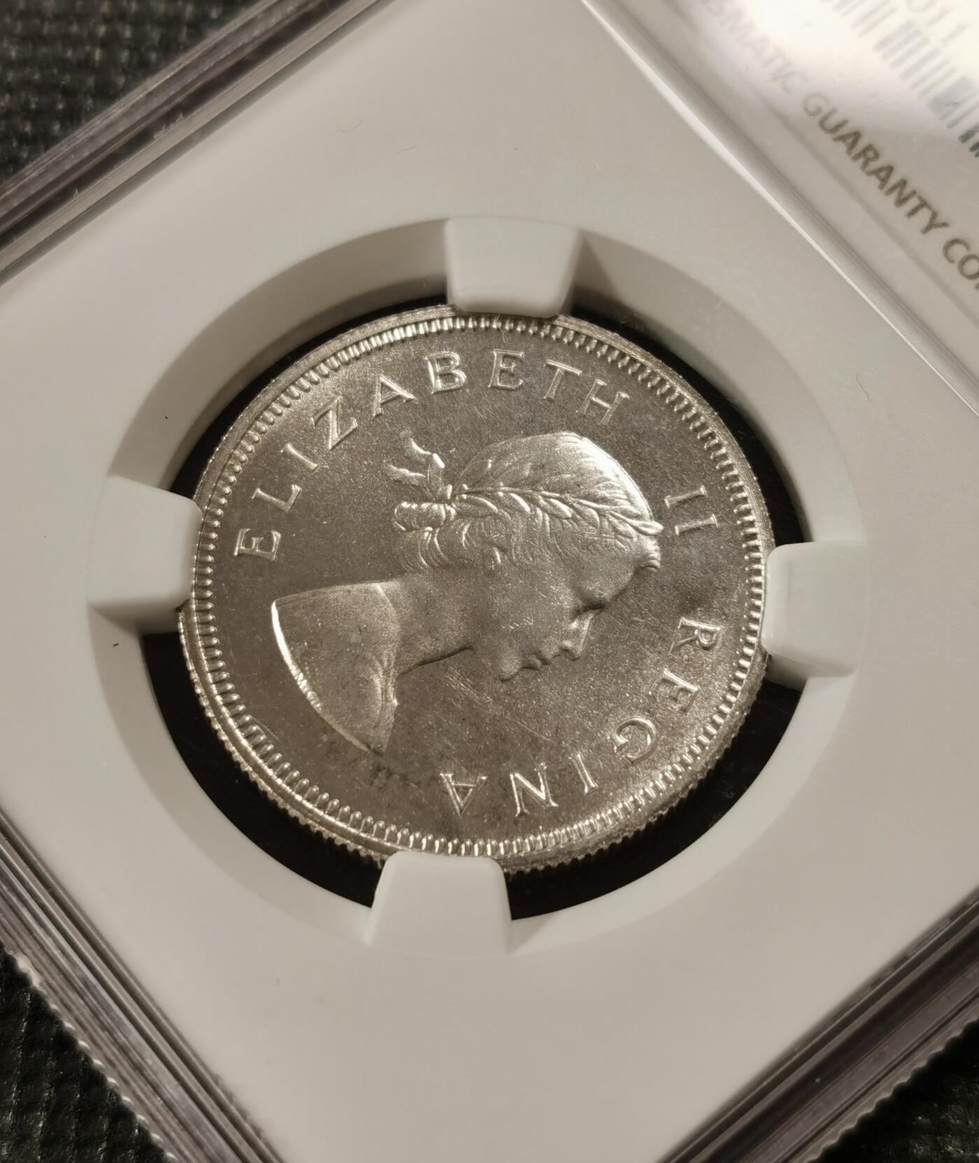 甄臻铺-世界钱币拍卖-南非西非东非专场（第10期）送拍享返佣金等优惠多多 NGC-PF66 英属南非 1953 2先令 银币精制 原味包浆，币面转光