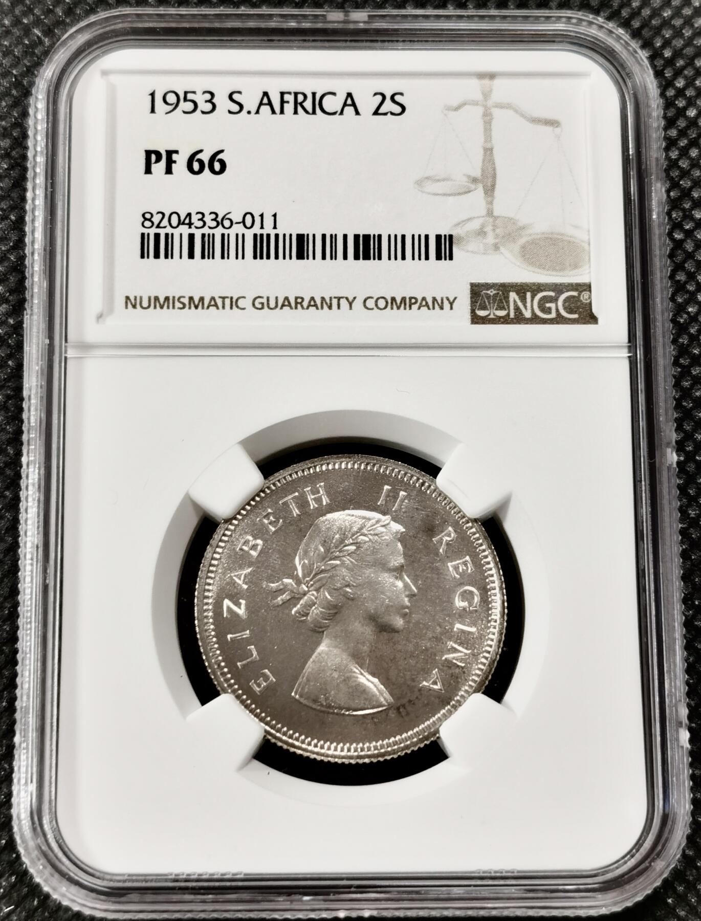 甄臻铺-世界钱币拍卖-南非西非东非专场（第10期）送拍享返佣金等优惠多多 NGC-PF66 英属南非 1953 2先令 银币精制 原味包浆，币面转光