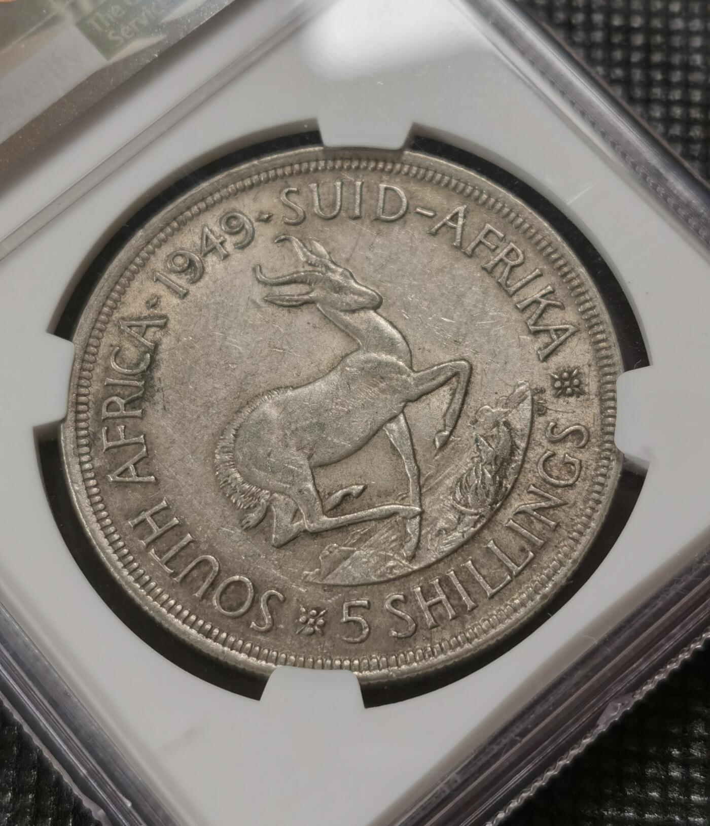甄臻铺-世界钱币拍卖-南非西非东非专场（第10期）送拍享返佣金等优惠多多 NGC-AU58 英属南非 1949 5先令 银币 原味包浆，币面漂亮