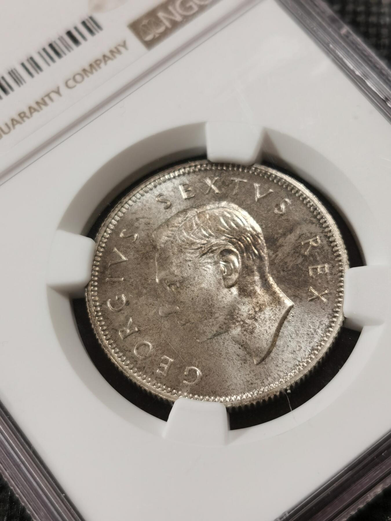 甄臻铺-世界钱币拍卖-南非西非东非专场（第10期）送拍享返佣金等优惠多多 NGC-PF66 英属南非 1952 2先令 银币精制 原味包浆，币面转光