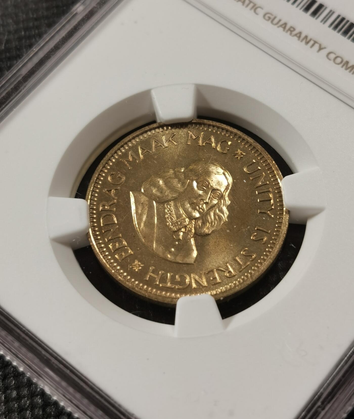 甄臻铺-世界钱币拍卖-南非西非东非专场（第10期）送拍享返佣金等优惠多多 NGC-PF64 南非 1961 1/2分 吕贝克首年精制铜币 币面转光，少见