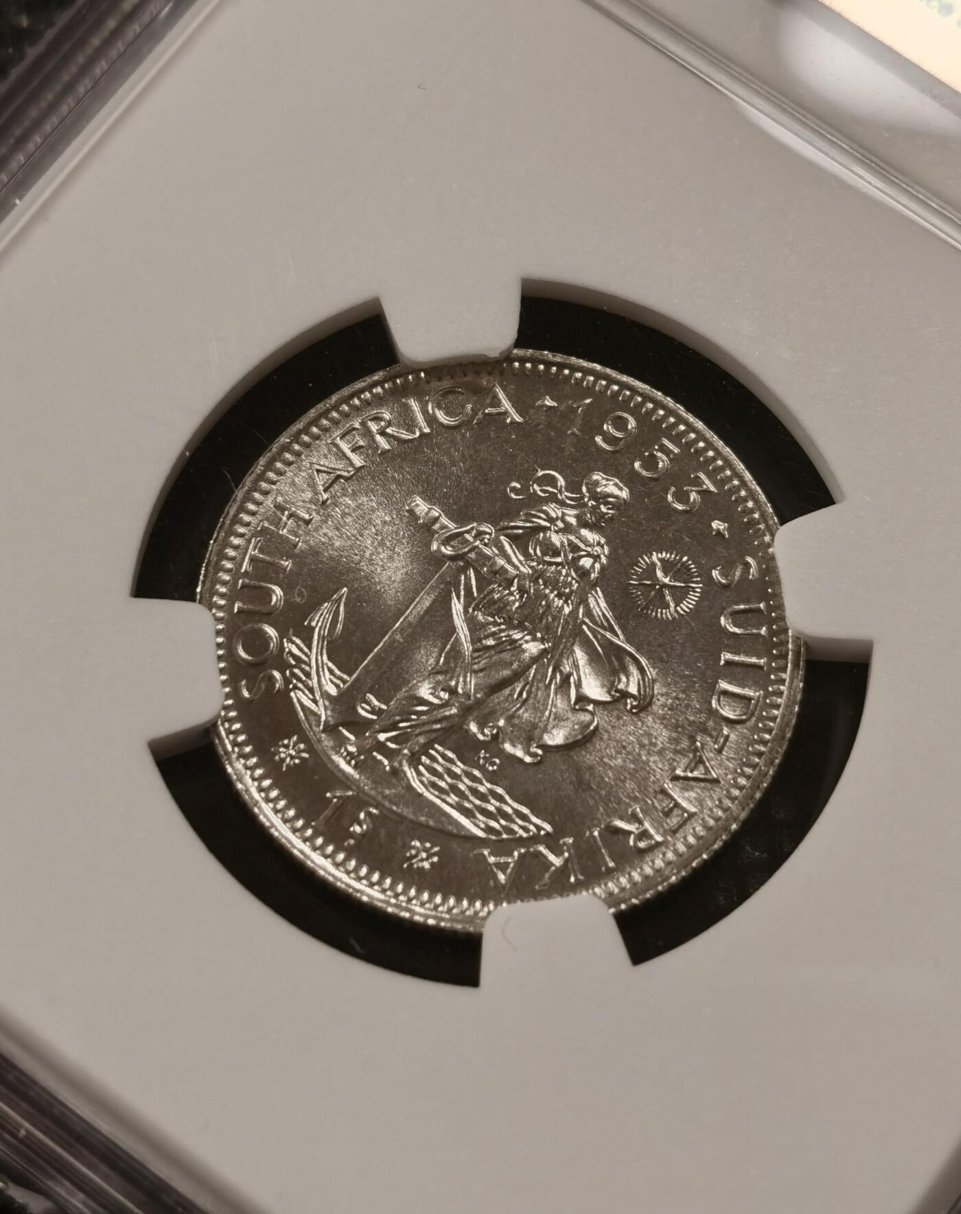 甄臻铺-世界钱币拍卖-南非西非东非专场（第10期）送拍享返佣金等优惠多多 NGC-PF65 英属南非 1953 1先令 银币精制 原味包浆，币面转光