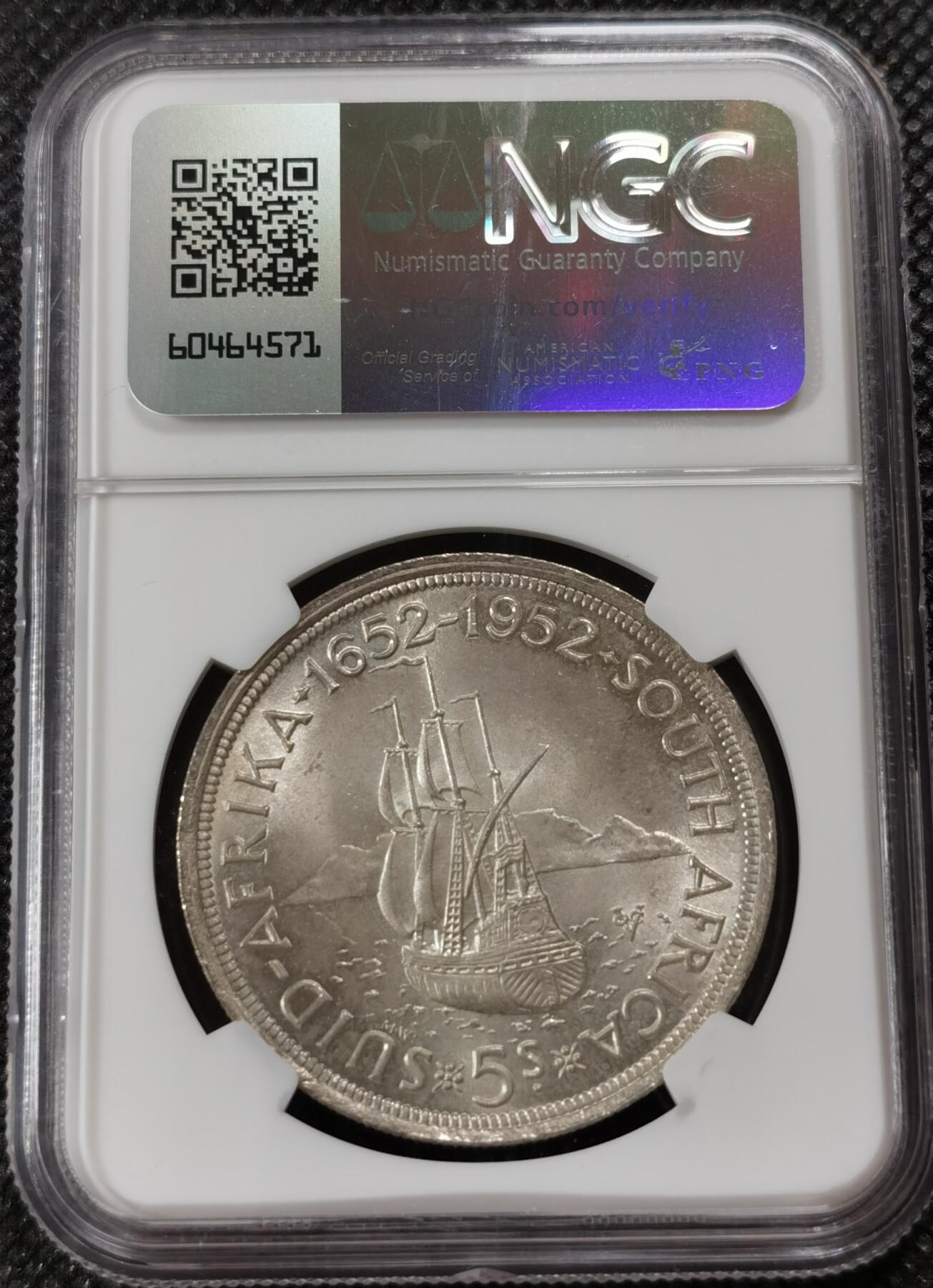 甄臻铺-世界钱币拍卖-南非西非东非专场（第10期）送拍享返佣金等优惠多多 NGC-MS64 南非 1952 乔治六世5先令 银币 发现开普敦300周年，品相难遇，大多63分，此枚64，自然淡黄油包浆