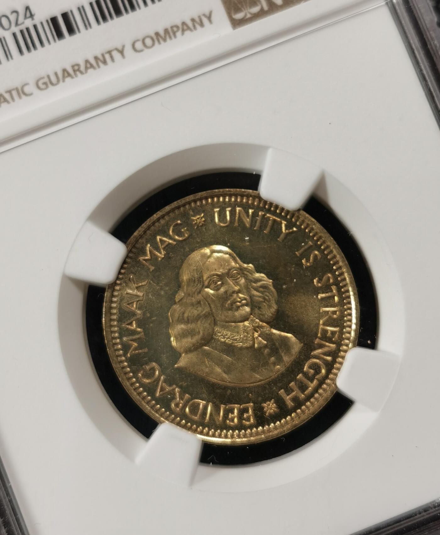 甄臻铺-世界钱币拍卖-南非西非东非专场（第10期）送拍享返佣金等优惠多多 NGC-PF64 南非 1961 1/2分 吕贝克首年精制铜币 币面转光，少见