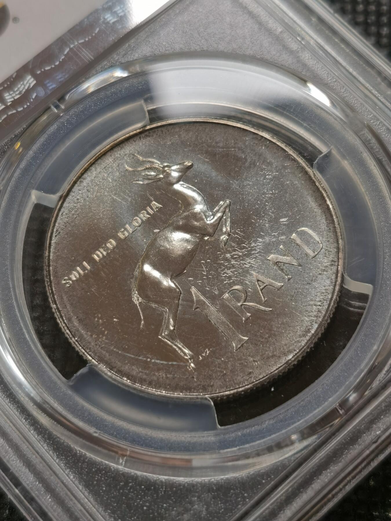 甄臻铺-世界钱币拍卖-南非西非东非专场（第10期）送拍享返佣金等优惠多多 PCGS-PR66 南非 1966 1兰特吕贝克精制银币，币面转光，收藏级