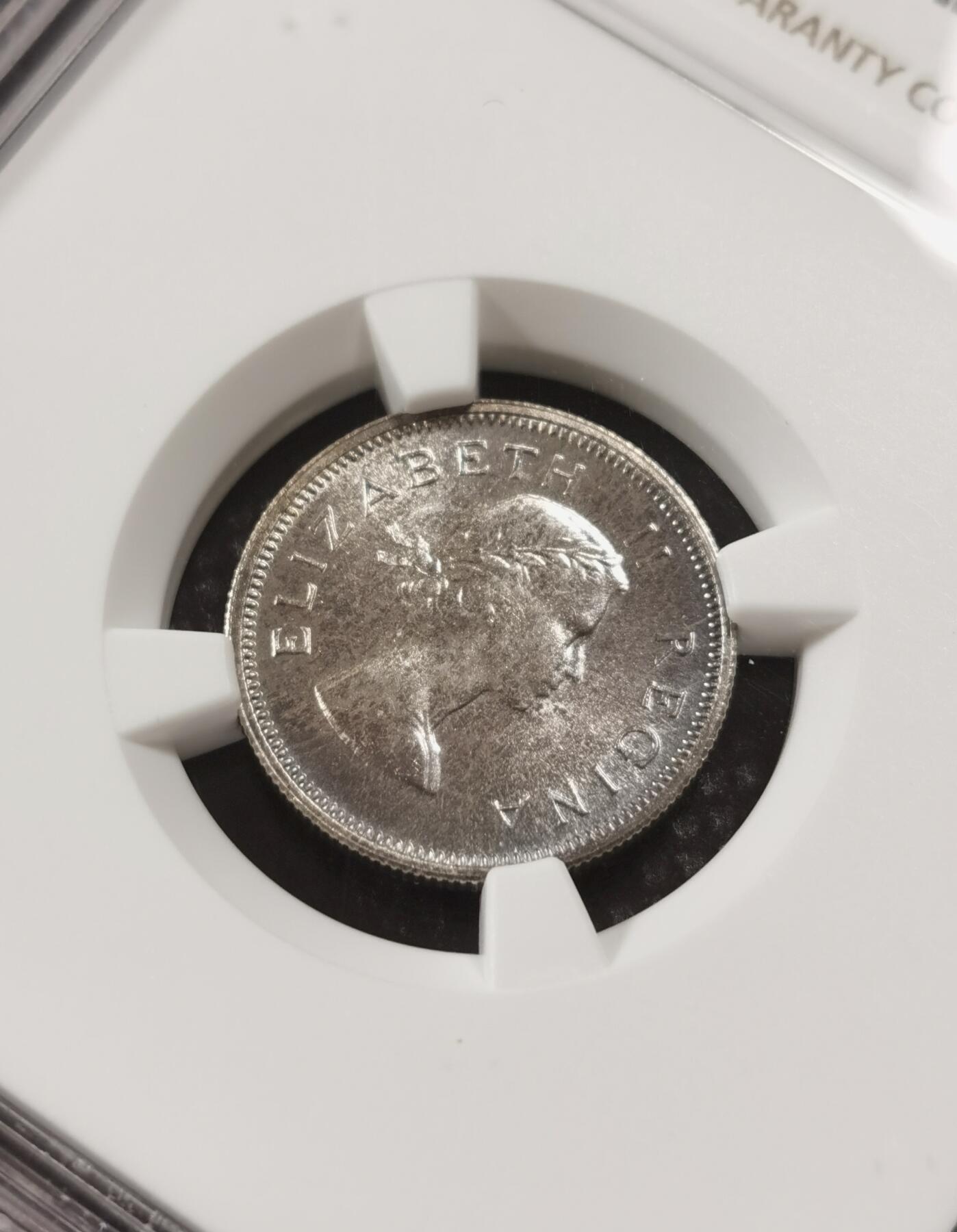 甄臻铺-世界钱币拍卖-南非西非东非专场（第10期）送拍享返佣金等优惠多多 NGC-PF66 英属南非 1953 6便士 精制 原味包浆，币面转光