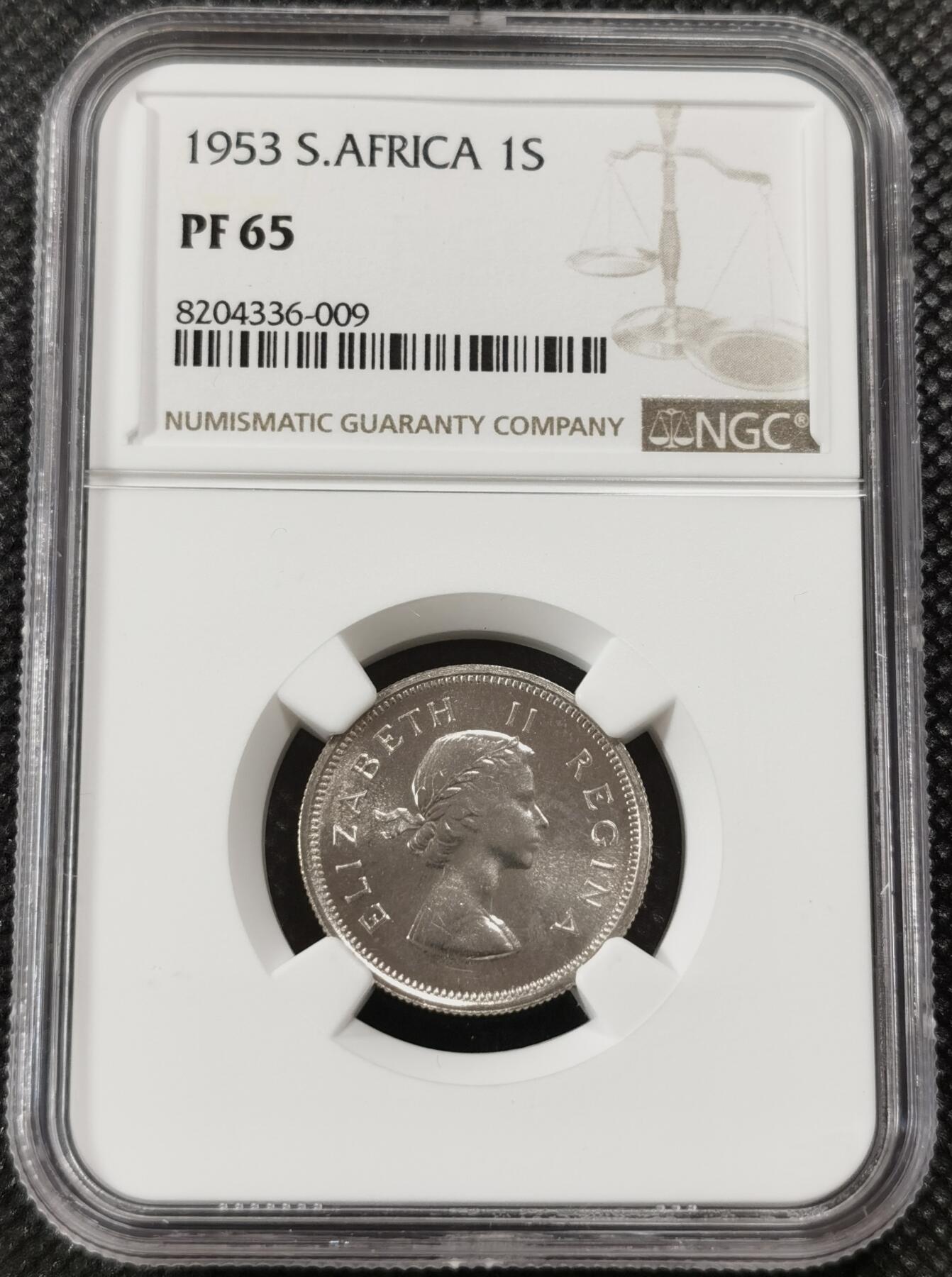 甄臻铺-世界钱币拍卖-南非西非东非专场（第10期）送拍享返佣金等优惠多多 NGC-PF65 英属南非 1953 1先令 银币精制 原味包浆，币面转光