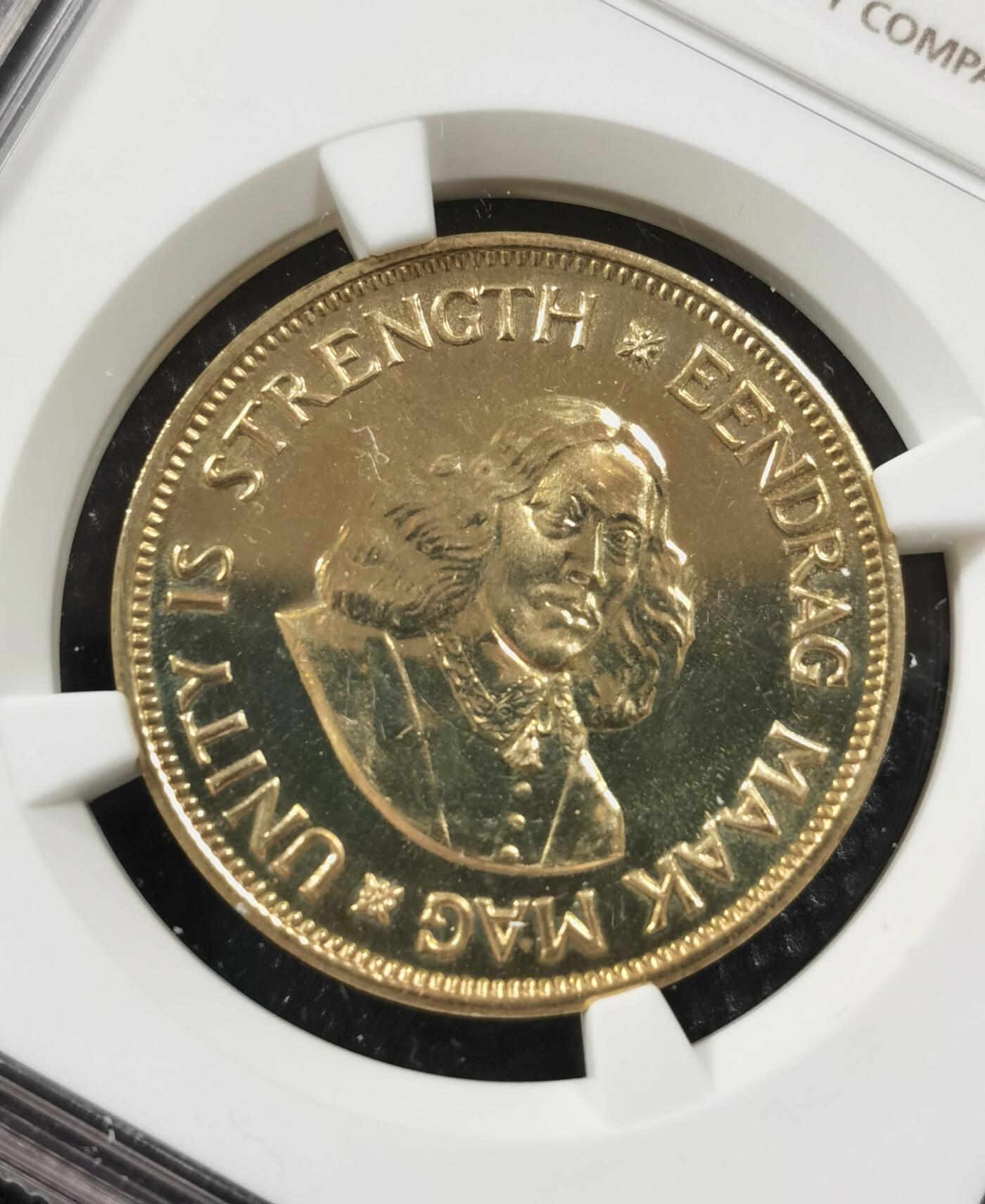 甄臻铺-世界钱币拍卖-南非西非东非专场（第10期）送拍享返佣金等优惠多多 NGC-PF63 南非 1961 1分 吕贝克首年精制铜币 币面转光，少见