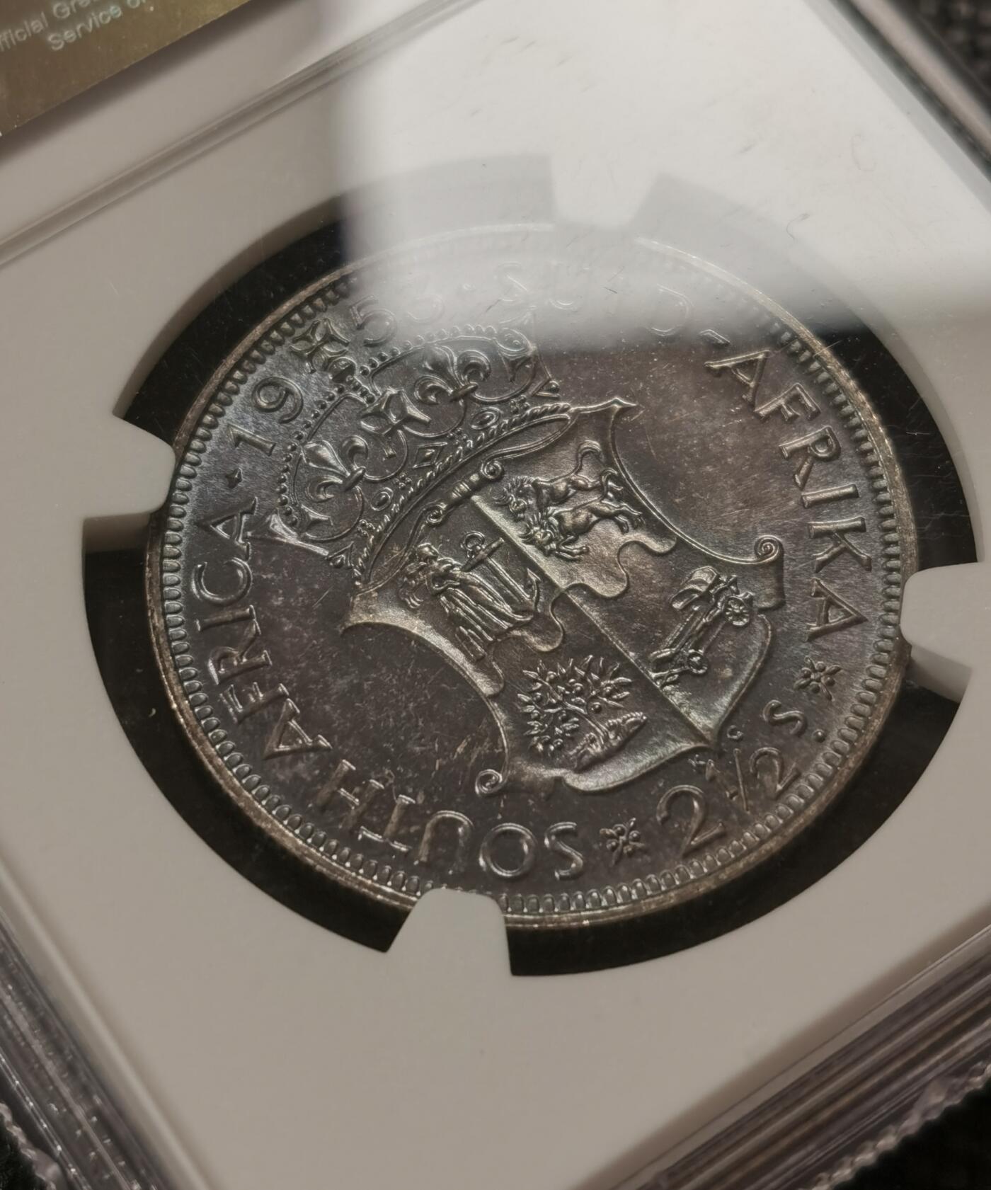 甄臻铺-世界钱币拍卖-南非西非东非专场（第10期）送拍享返佣金等优惠多多 NGC-PF64 英属南非 1953 2.5先令 银币精制 原味包浆，币面转光