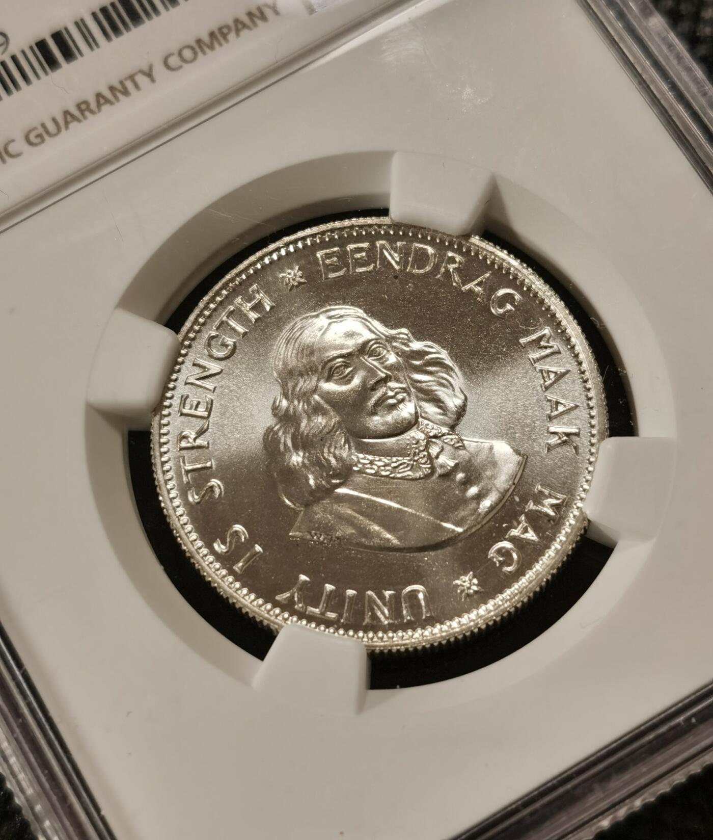 甄臻铺-世界钱币拍卖-南非西非东非专场（第10期）送拍享返佣金等优惠多多 NGC-PF67 南非 1961 20分 吕贝克首年精制银币 币面转光，少见