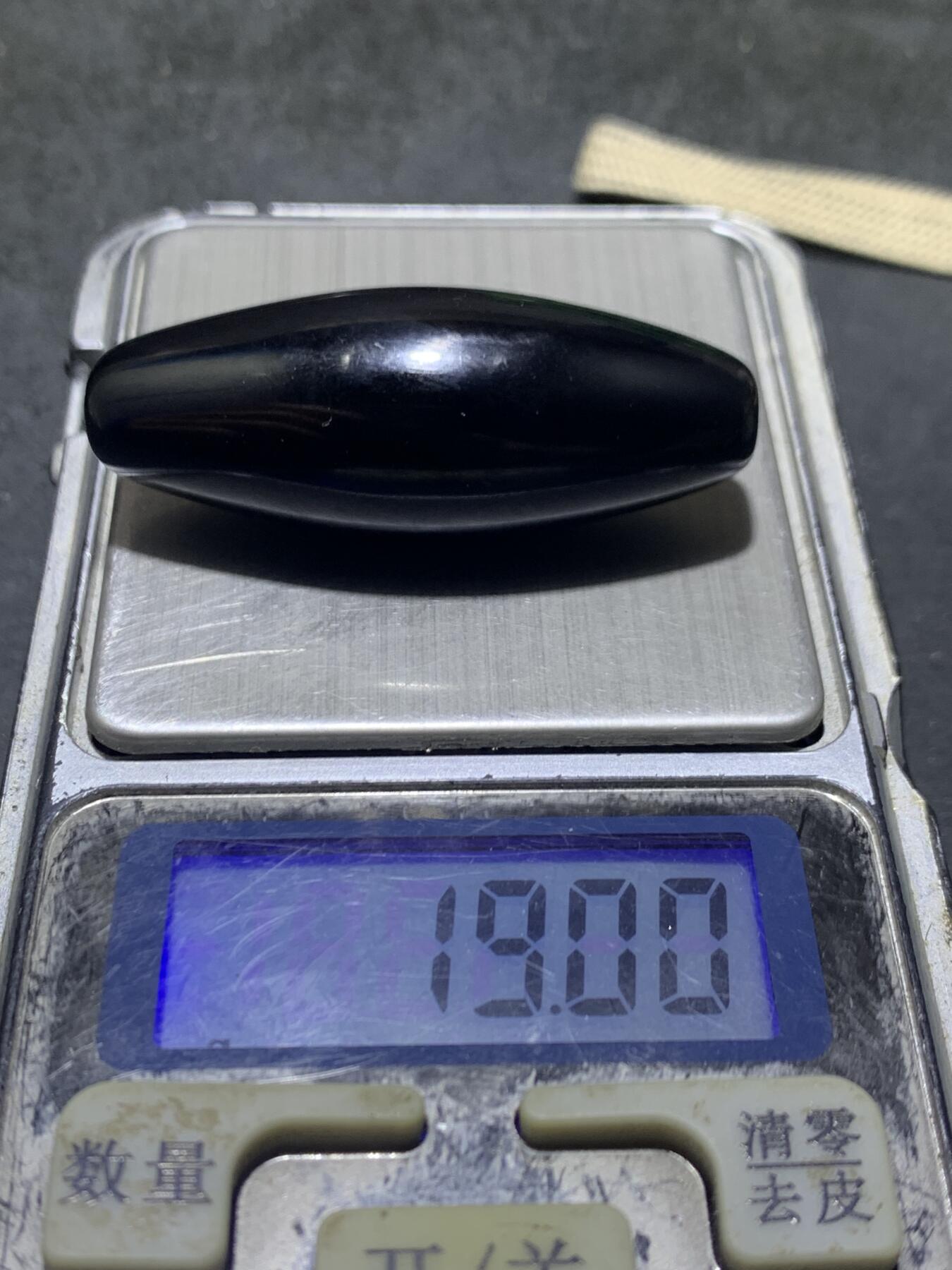 药师玛瑙天眼随形大桶珠一颗，
