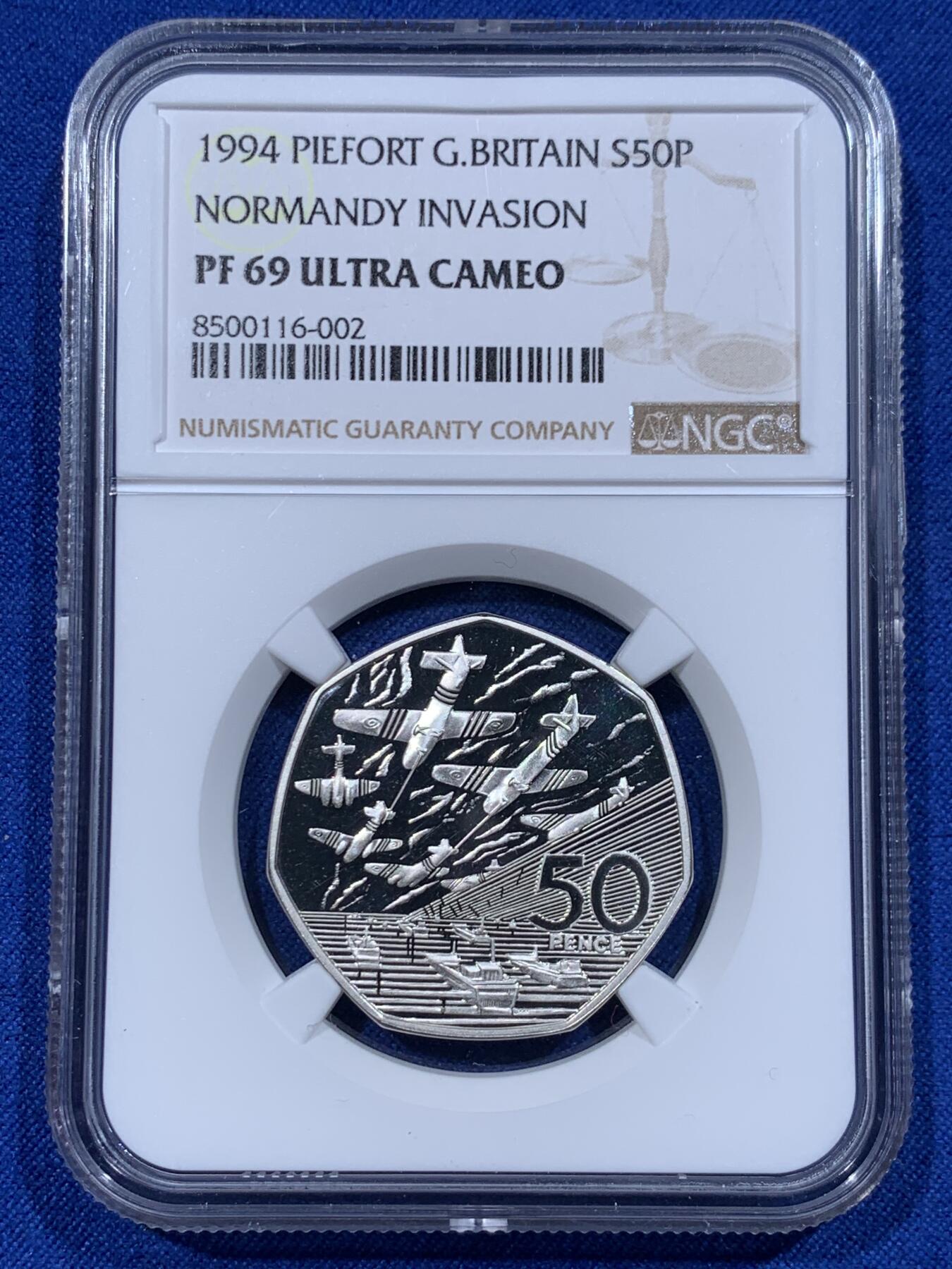 《竞宝斋》第365场 周日，周一 2场连拍 （全场包邮） NGC PF69UC 英国1994年诺曼底登陆50周年加厚版50便士精制纪念银币，【获奖币】荣膺克劳斯1996年大奖赛之最佳硬币、最受欢迎、最佳时事币（限量发行10000枚，重27克，925银材质，30MM币径，附带原厂盒证）