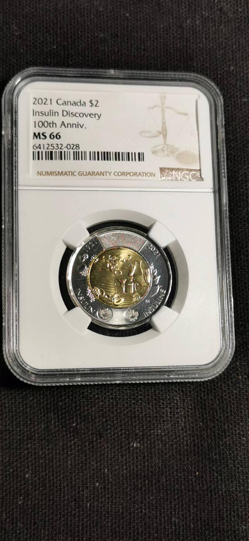 刘世昌艺术品销售中心～虎踞龙蟠*金杨在线联拍群第510期 加拿大2021年“胰岛素发现百年”2元双金属纪念币（NGC    MS66    串号：6412532-028）1枚。