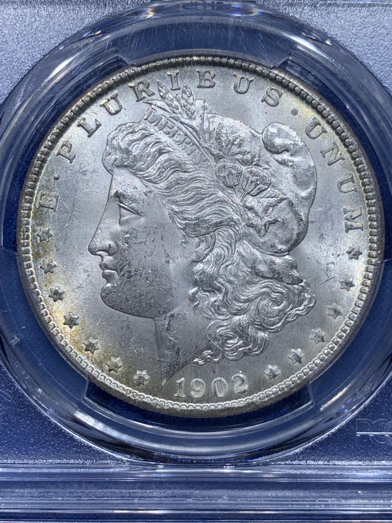 《竞宝斋》第366场 周日，周一 2场连拍 （全场包邮） PCGS MS64 美国1902年O版摩根一元银币 底板丝滑 年份也不错 淡黄彩可藏