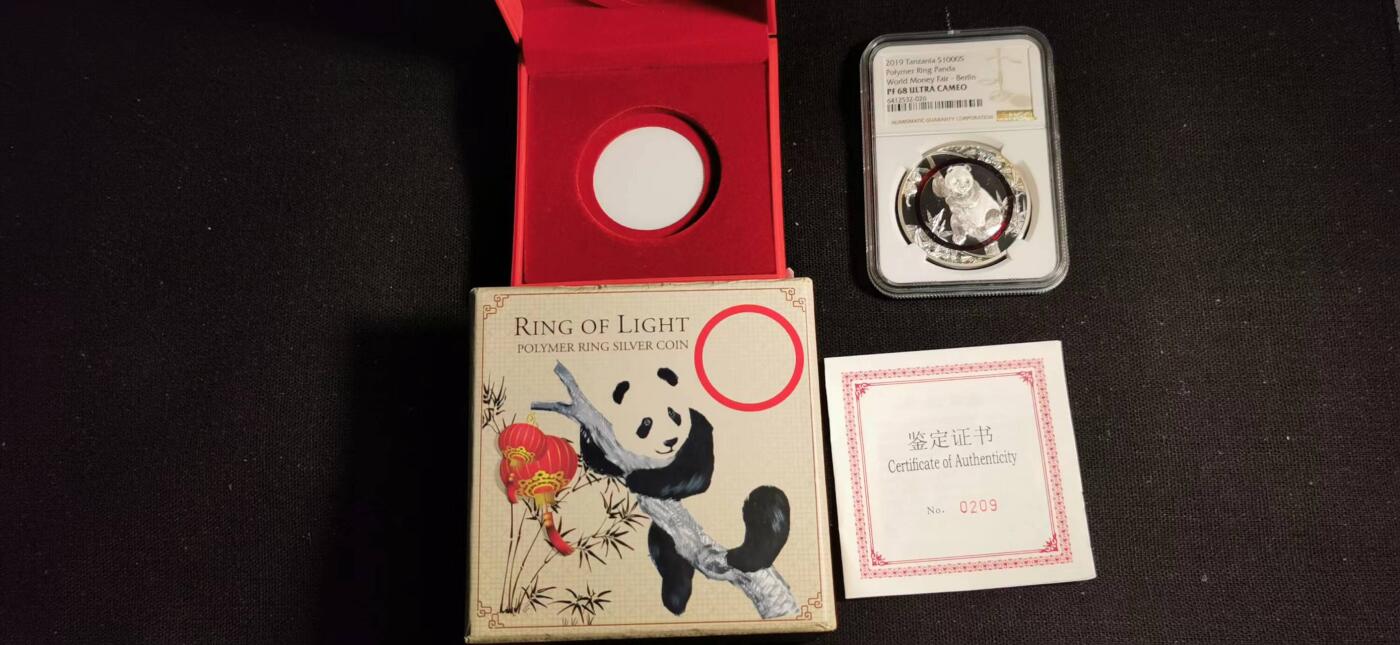刘世昌艺术品销售中心～虎踞龙蟠*金杨在线联拍群第508期 坦桑尼亚2019年“熊猫聚合物环”1盎司精制纪念银币（NGC    PF68UC    串号：6412532-026）1枚，原盒证。