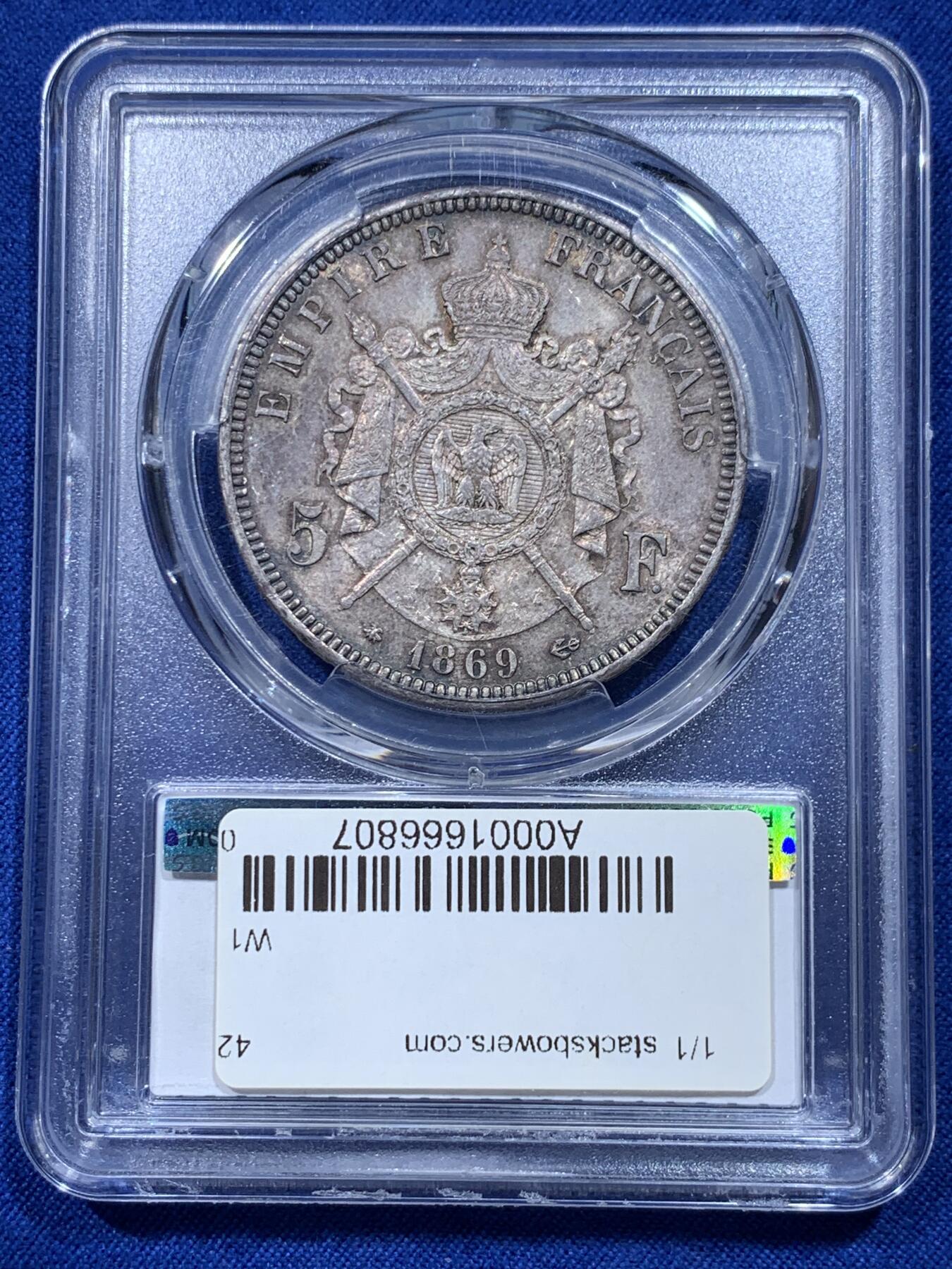 《竞宝斋》第366场 周日，周一 2场连拍 （全场包邮） PCGS MS62 法国1869年A厂拿三5法郎大银币，系列中的特年，铸量仅200万，不到常见1868BB版的六分之一，书价是后者的近2倍。更高分仅11枚，同年同厂的MS平台首次上拍，不容错过