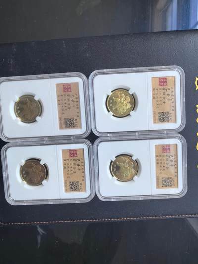 综合藏品场.喜欢出价就得！无套路无托.诚信惠友交友！自动快拍. 2009年纪念币乙丑牛4枚！实图拍摄按图发货