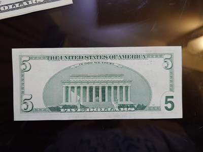 【世界钱币】精选微拍第173期暨2025年第12期  部分卖剩新品上架  1999年美国5元补号 大头 较少年份 全新绝品刀拆 尾94