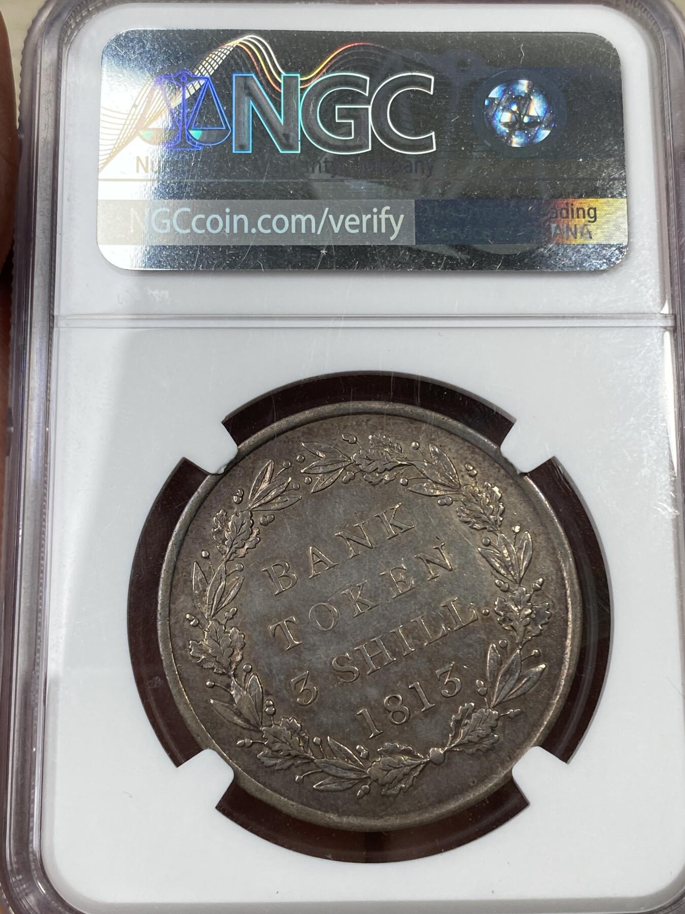 万国钱币拍卖第044期 NGC AUD 1813年英国乔治三世英格兰银行3先令银币 英式淡彩包浆状态舒服