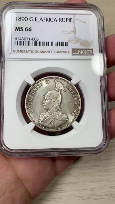 万国钱币拍卖第044期 NGC MS66 1890年德属东非威廉二世军装1卢比 原味环五彩顶级GEM品质 天花板级别品相 难度和UNC不是一个级别 一枚永不换藏 HA同分的1891成交价3w+