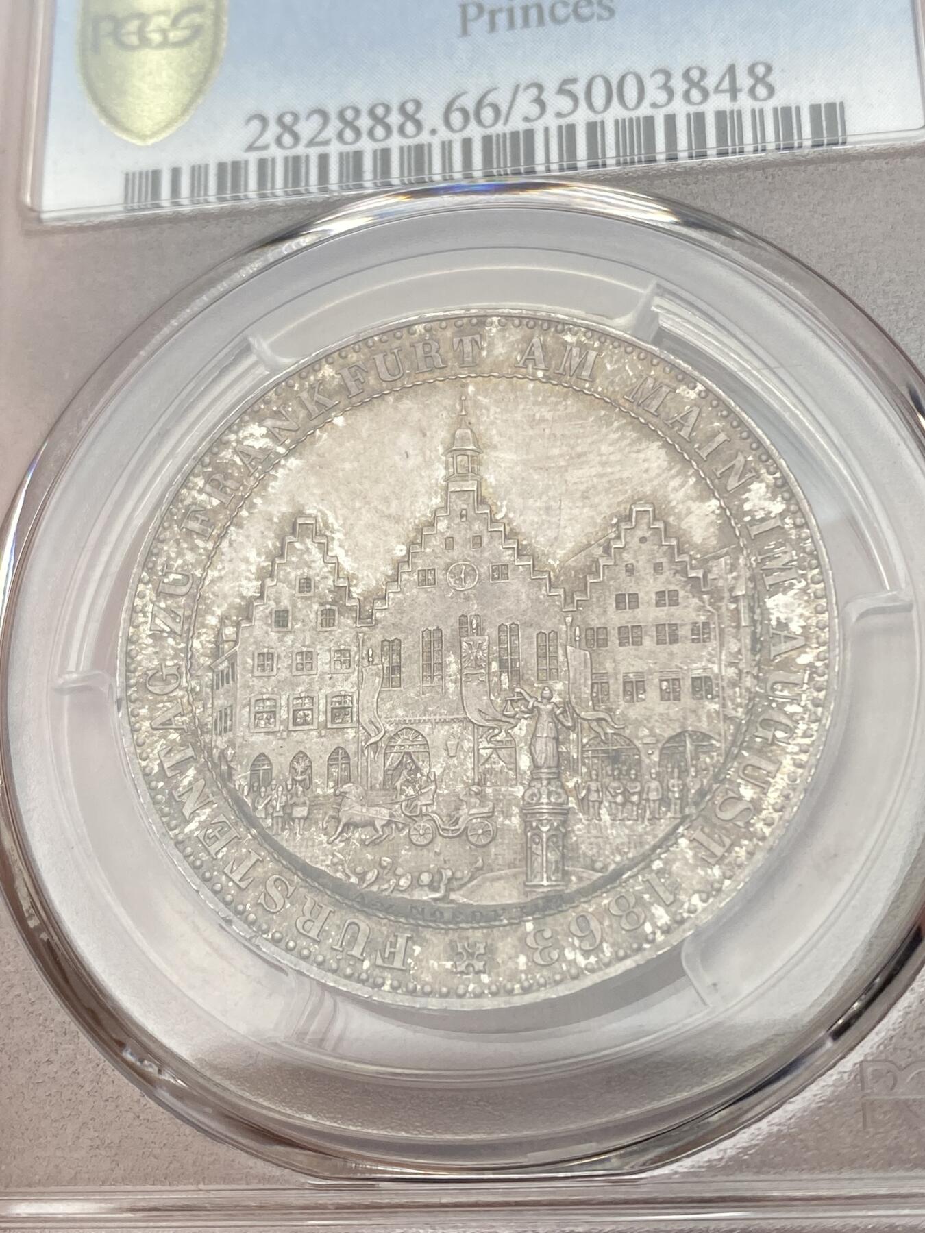 万国钱币拍卖第044期 PCGS MS66 1863年德国法兰克福王子议会泰勒 顶级五彩BU品相 肉眼无暇状态 各方面都挑不出毛病的一枚 