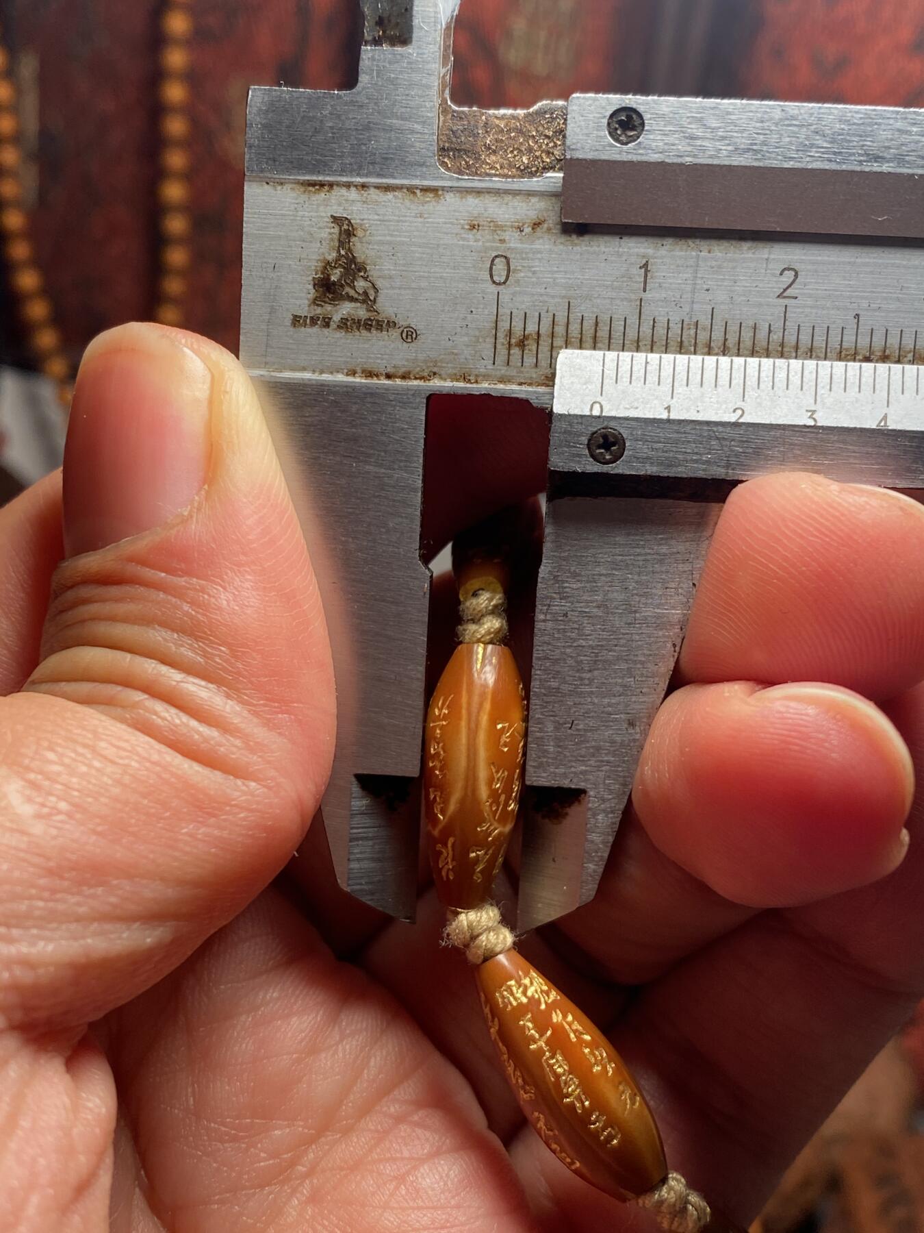 福利苏工核雕纯手工雕刻铁核细长柳叶手工微型般若，小籽，市场少见，尺寸0。78x1.9喜欢的来价不贵