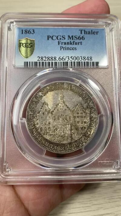 万国钱币拍卖第044期 PCGS MS66 1863年德国法兰克福王子议会泰勒 顶级五彩BU品相 肉眼无暇状态 各方面都挑不出毛病的一枚 