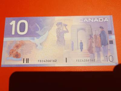 【世界钱币】精选微拍第173期暨2025年第12期  部分卖剩新品上架  2001年加拿大10元旅版 初版全新绝品尾号6162