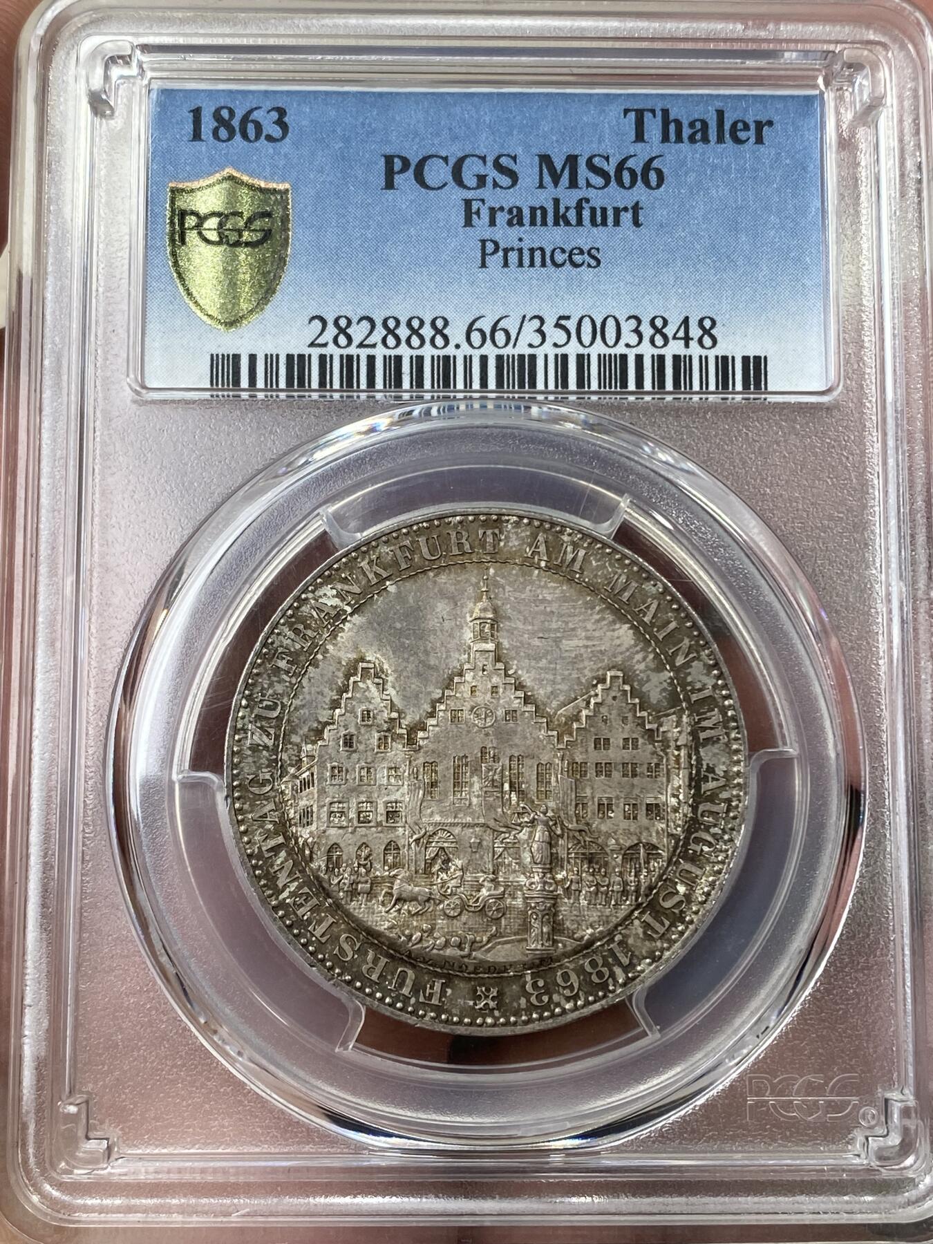 万国钱币拍卖第044期 PCGS MS66 1863年德国法兰克福王子议会泰勒 顶级五彩BU品相 肉眼无暇状态 各方面都挑不出毛病的一枚 
