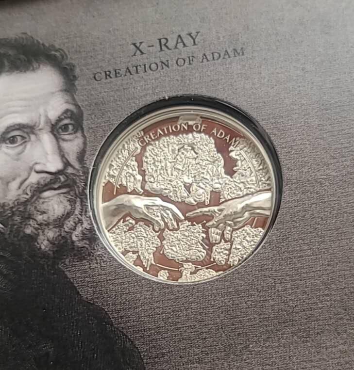 【币将精彩】世界钱币拍卖（2026-4-1） 库克2023年X光创造亚当1盎司彩色纪念银币  999银1盎司，直径38.61毫米，发行1500枚，带证书包装。