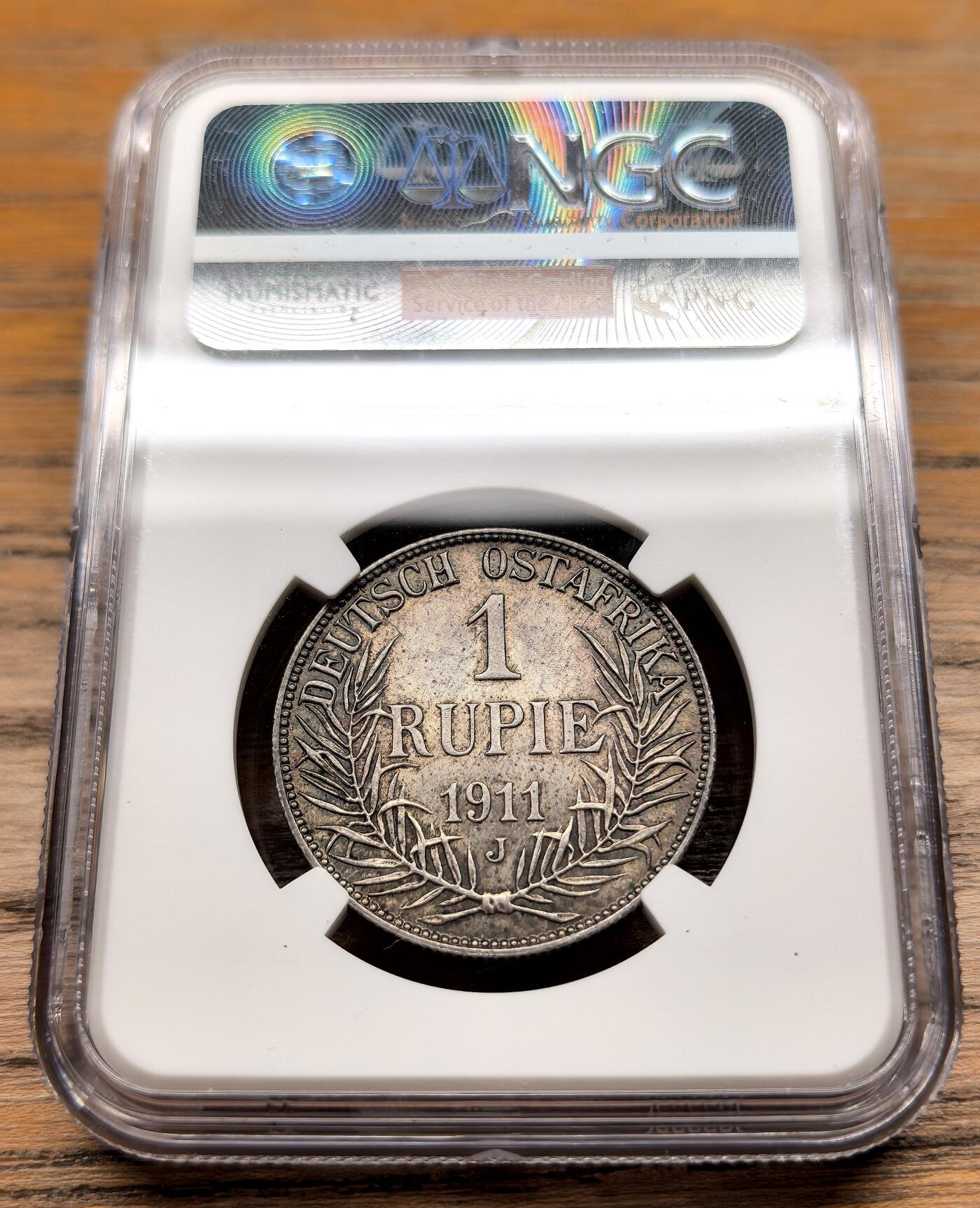 凡希社世界钱币微拍第三百期 1911J德属东非卢比银币NGC-MS62，灰彩收藏级。