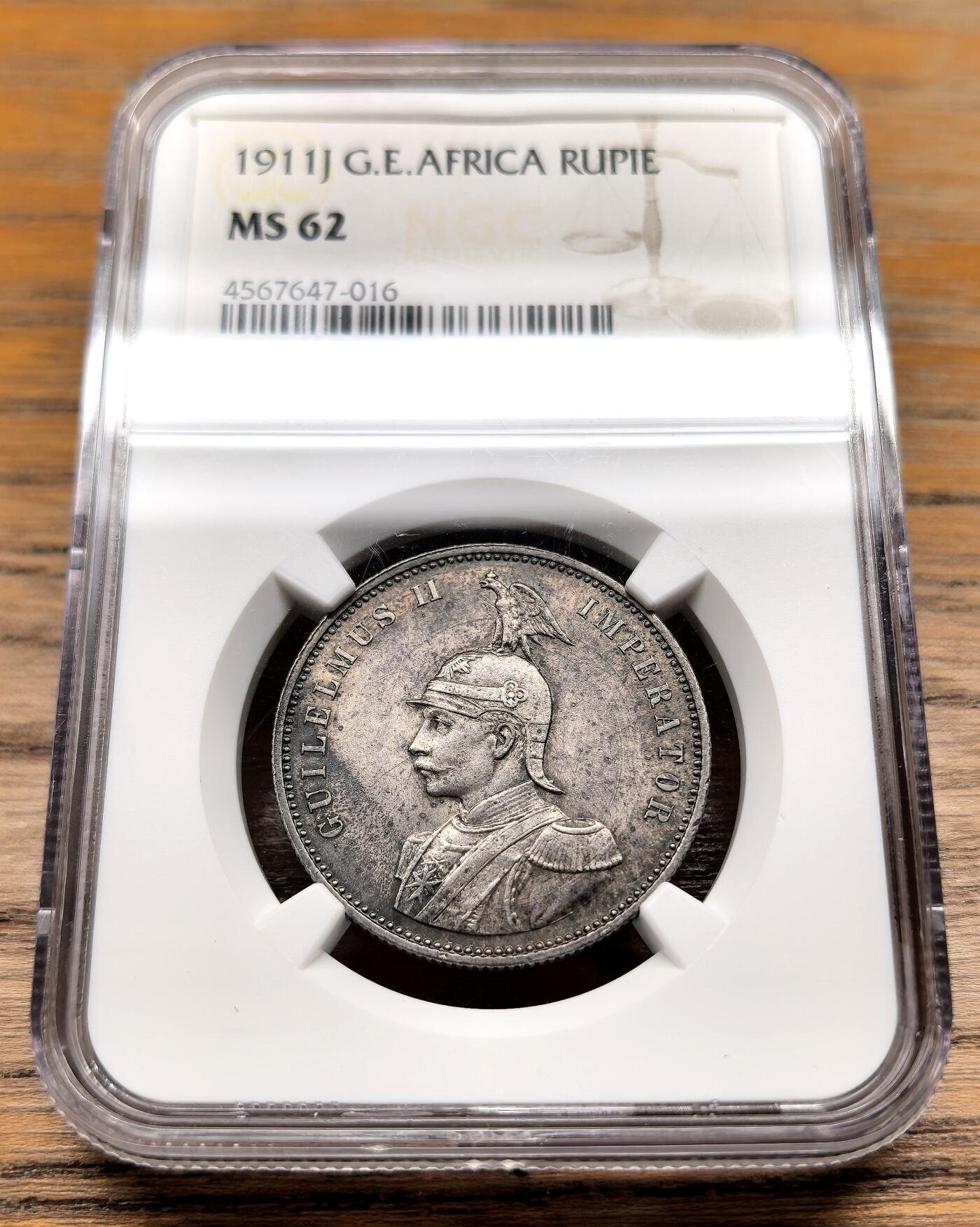 凡希社世界钱币微拍第三百期 1911J德属东非卢比银币NGC-MS62，灰彩收藏级。
