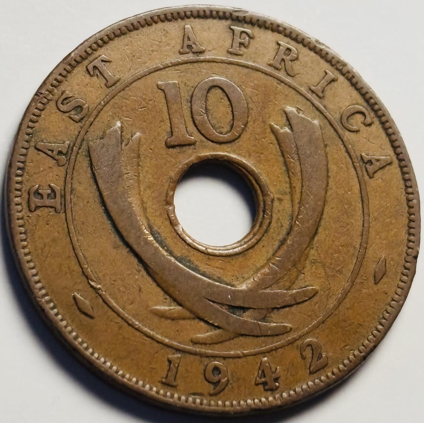 文馨钱币收藏第 233 场 1942 年英属东非乔治六世版中孔十分铜币