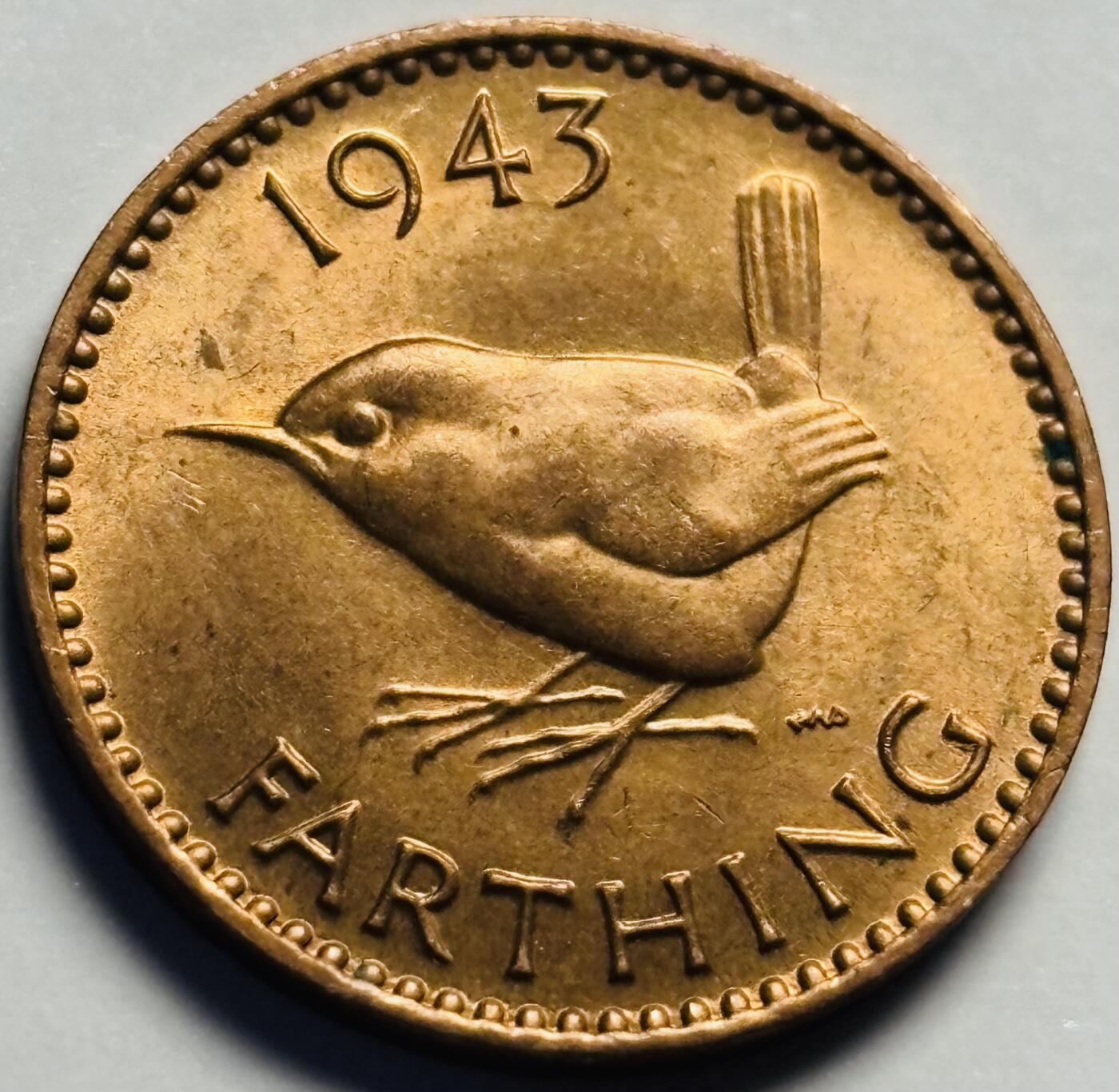 文馨钱币收藏第 233 场 少见全新 1943 年英国乔治六世版法新铜币