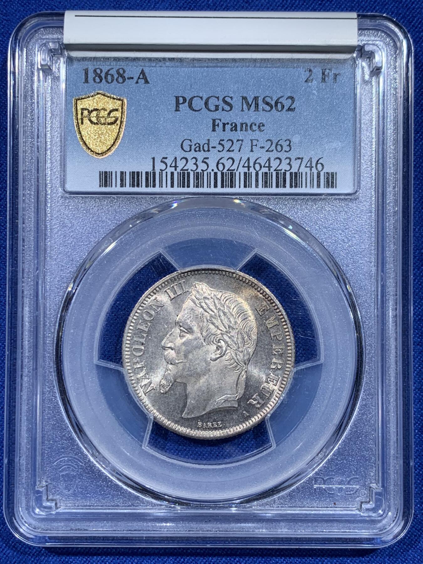 《竞宝斋》第367场 周日，周一 2场连拍 （全场包邮） PCGS MS62 法国1868年A版拿破仑三世2法郎银币，少见面值，流通充分，高分比5法郎少见很多。此枚银光丝滑如水，强烈转光，鹰毛纤毫毕现，状态好于分数！
