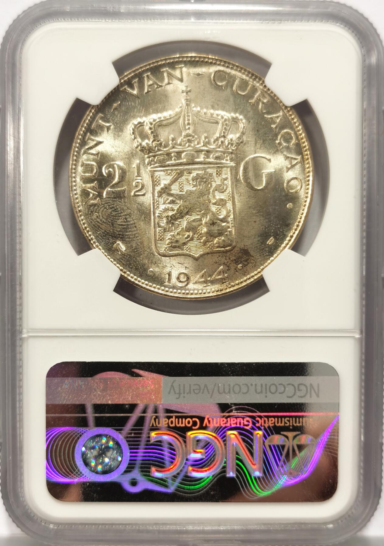 博洋堂世界钱币拍卖第117期（全场包邮） 1944年荷属库拉索威廉明娜2.5盾大银币NGC-MS62，量更少，二战期间由美国丹佛造币厂代理铸造。原汁原味老包浆，略为低评。