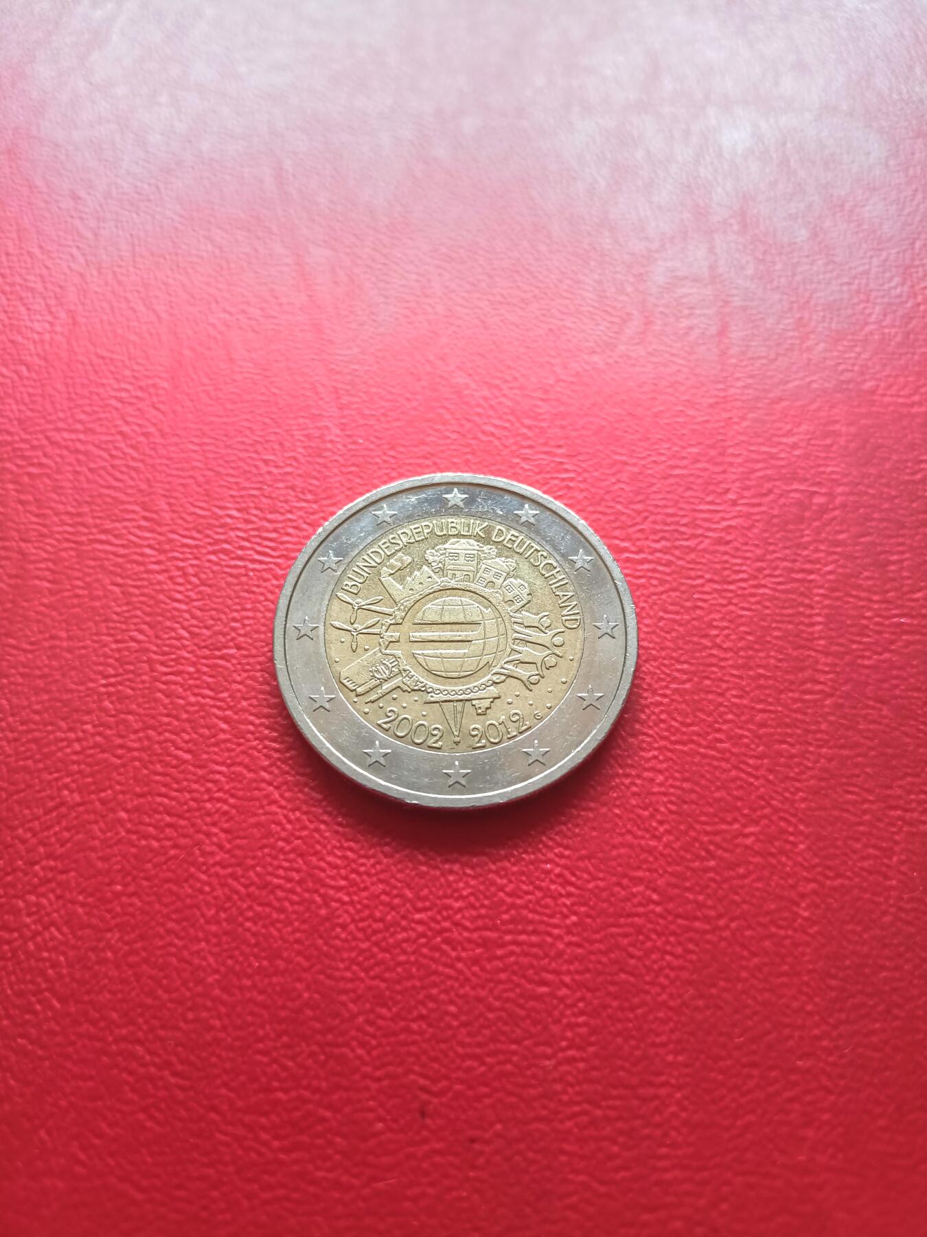 德国2012年殴元发行10周年2E纪念币，G标，UNC，面值地图处有一小划痕，特价，详见图片，按图发货。