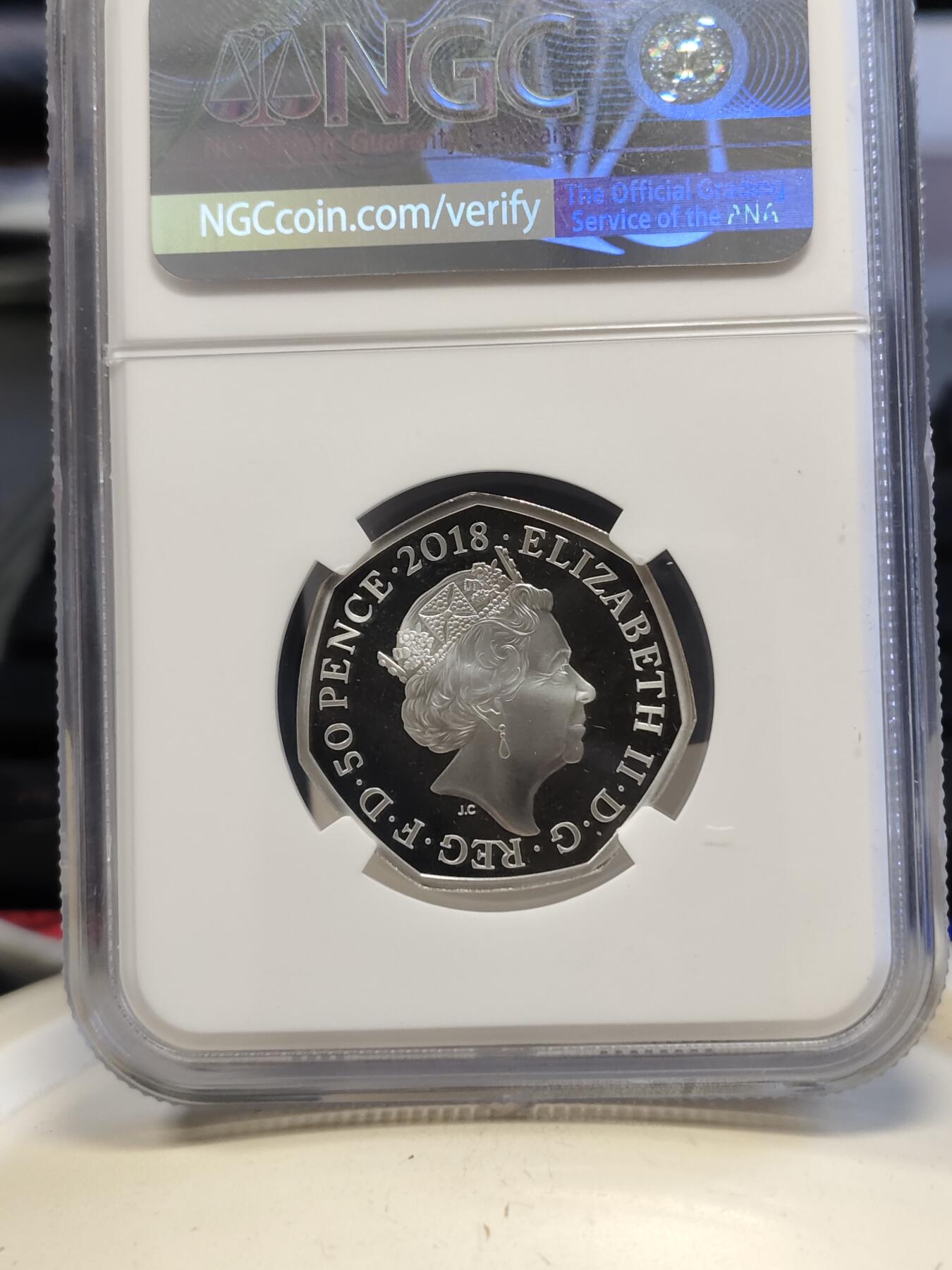 第168期拍卖【长期征集拍品】 英国2018年彼得兔系列点鼠太太50便士精制彩色银币NGC-PF69无盒无证书，925银，8克