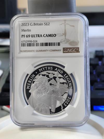 第168期拍卖【长期征集拍品】 - 英国2023年发行神话和传说系列-梅林2英镑精制纪念银币NGC-PF69原盒证书，999银，1盎司，发行2500枚