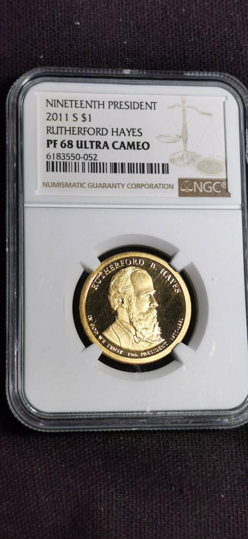刘世昌艺术品销售中心～虎踞龙蟠*金杨在线联拍群第513期 美国2011年“总统～拉斯福德.B.海斯”1美元精制纪念币（NGC    PF68UC    串号：6183550-052  ）1枚。